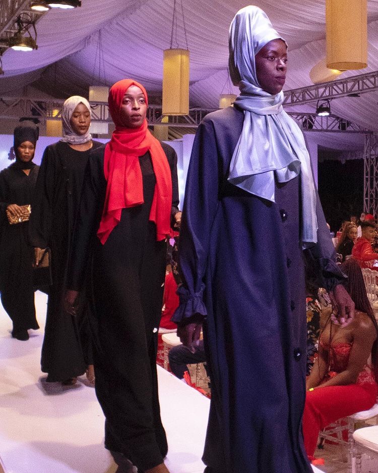 woman walking in a tanzanian fashion show