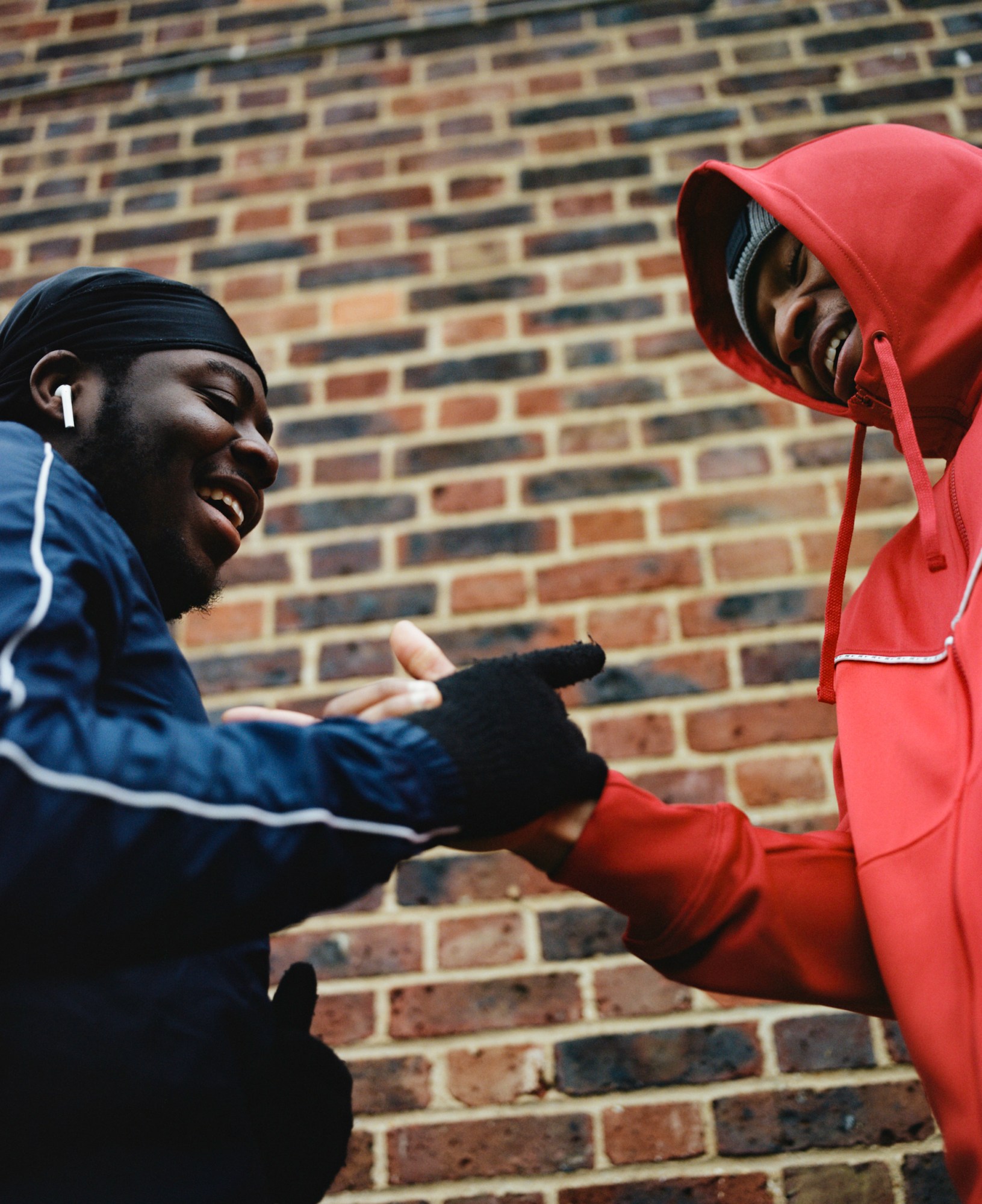 two friends shaking hands