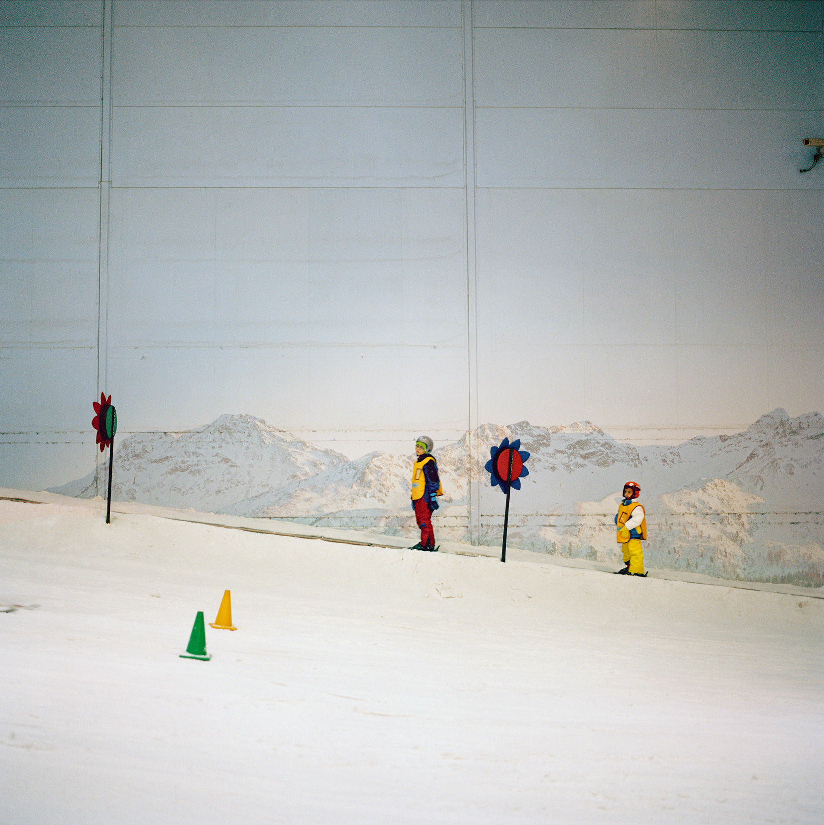 two children skiing in dubai