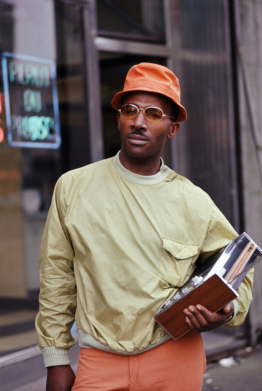 a man with a record player