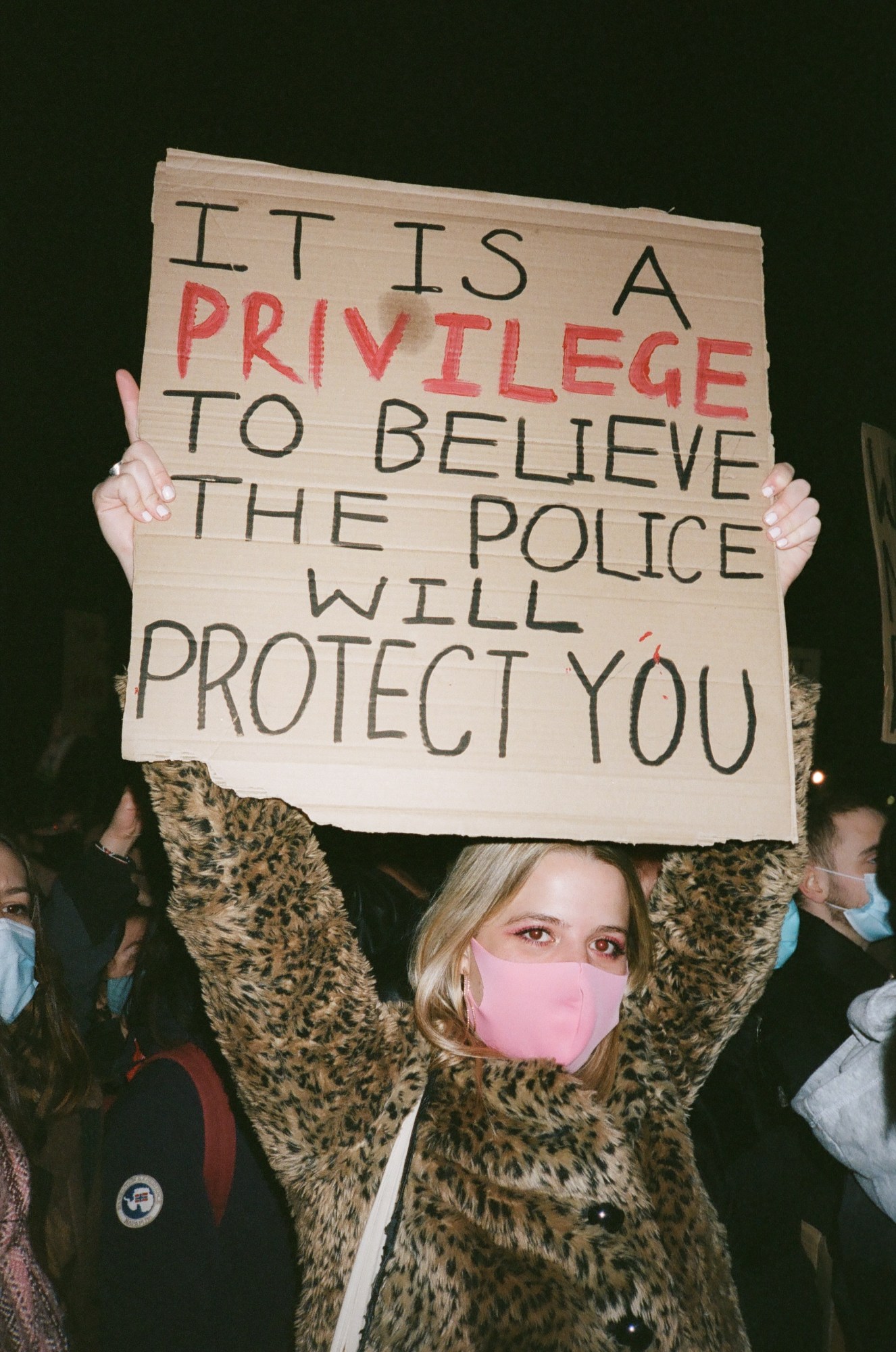 the crowd at a protest in london for sarah everard and male violence against women