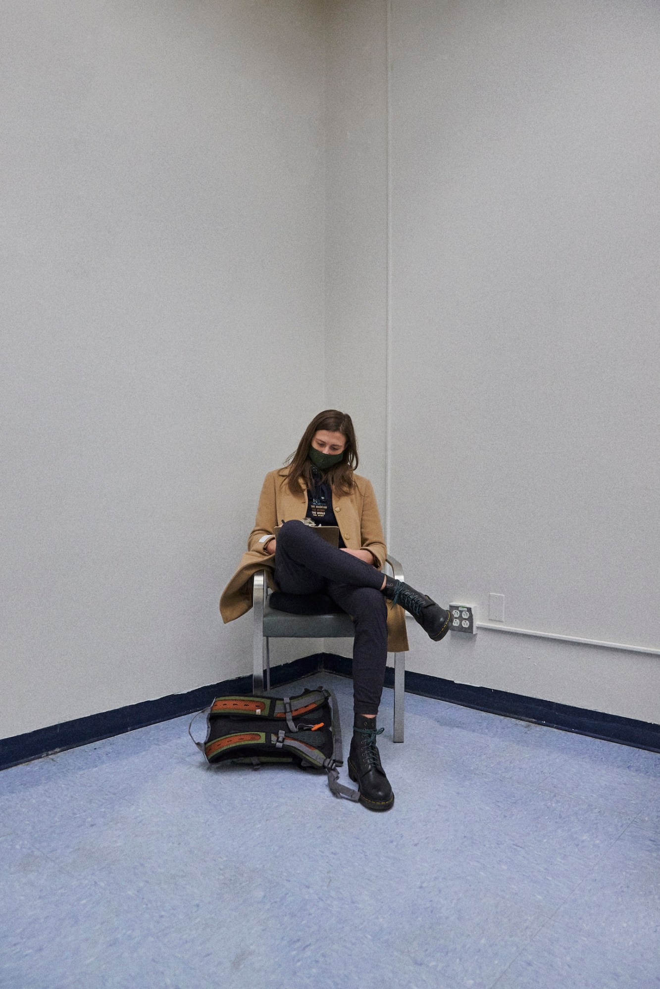 photograph of model Oliver Wight sitting in a chair