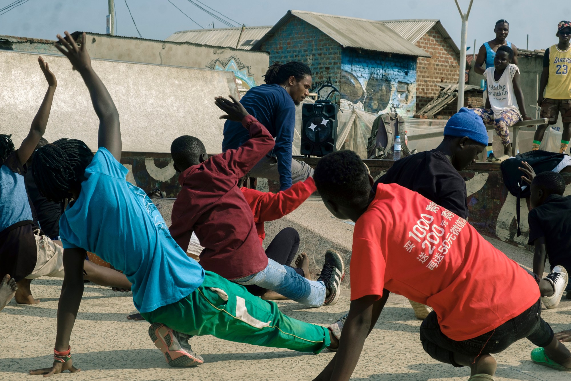 a group of men dancing in the street