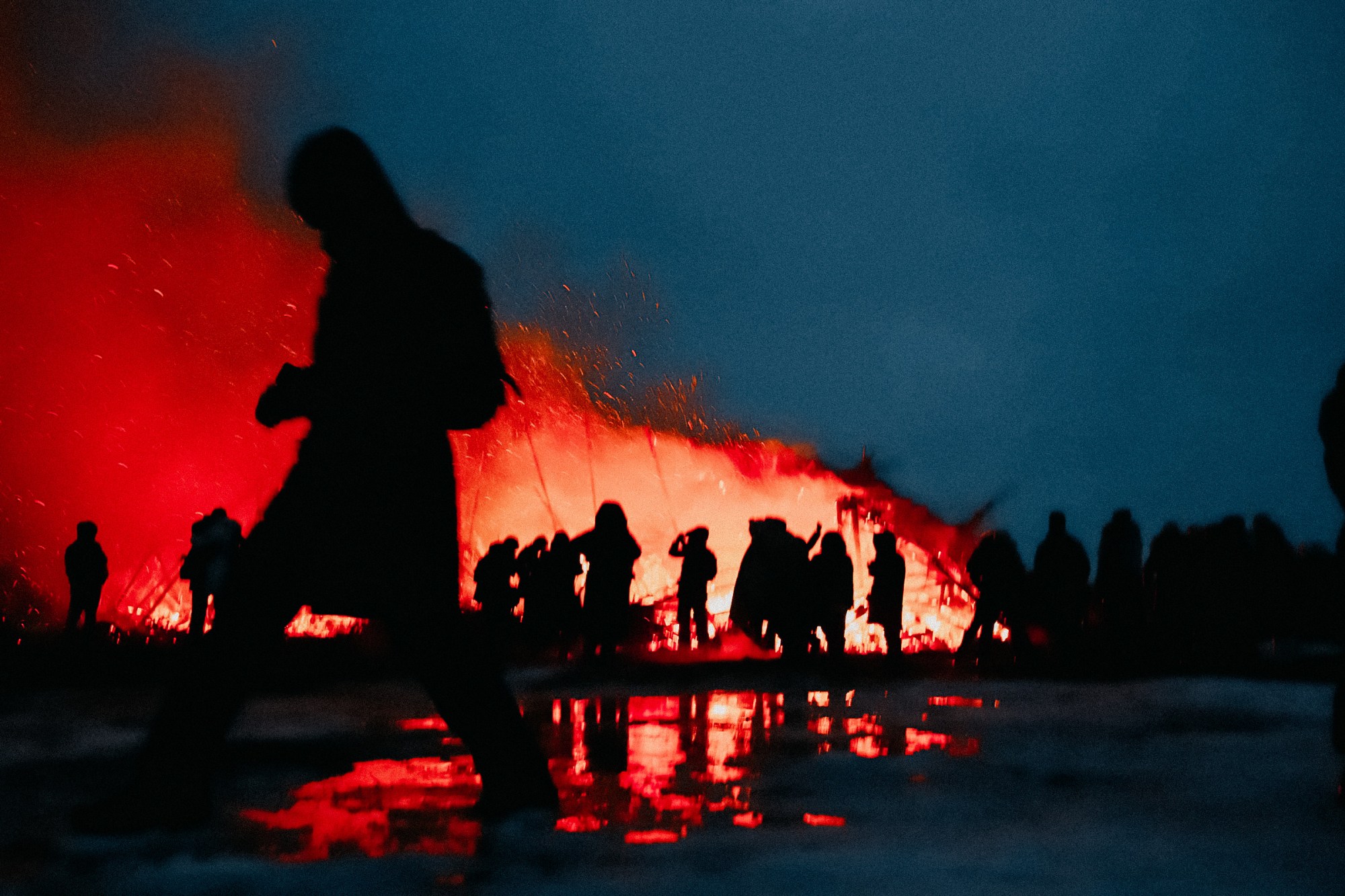 a burning effigy that represents coronavirus during a traditional russian holiday called 'Maslenitsa'