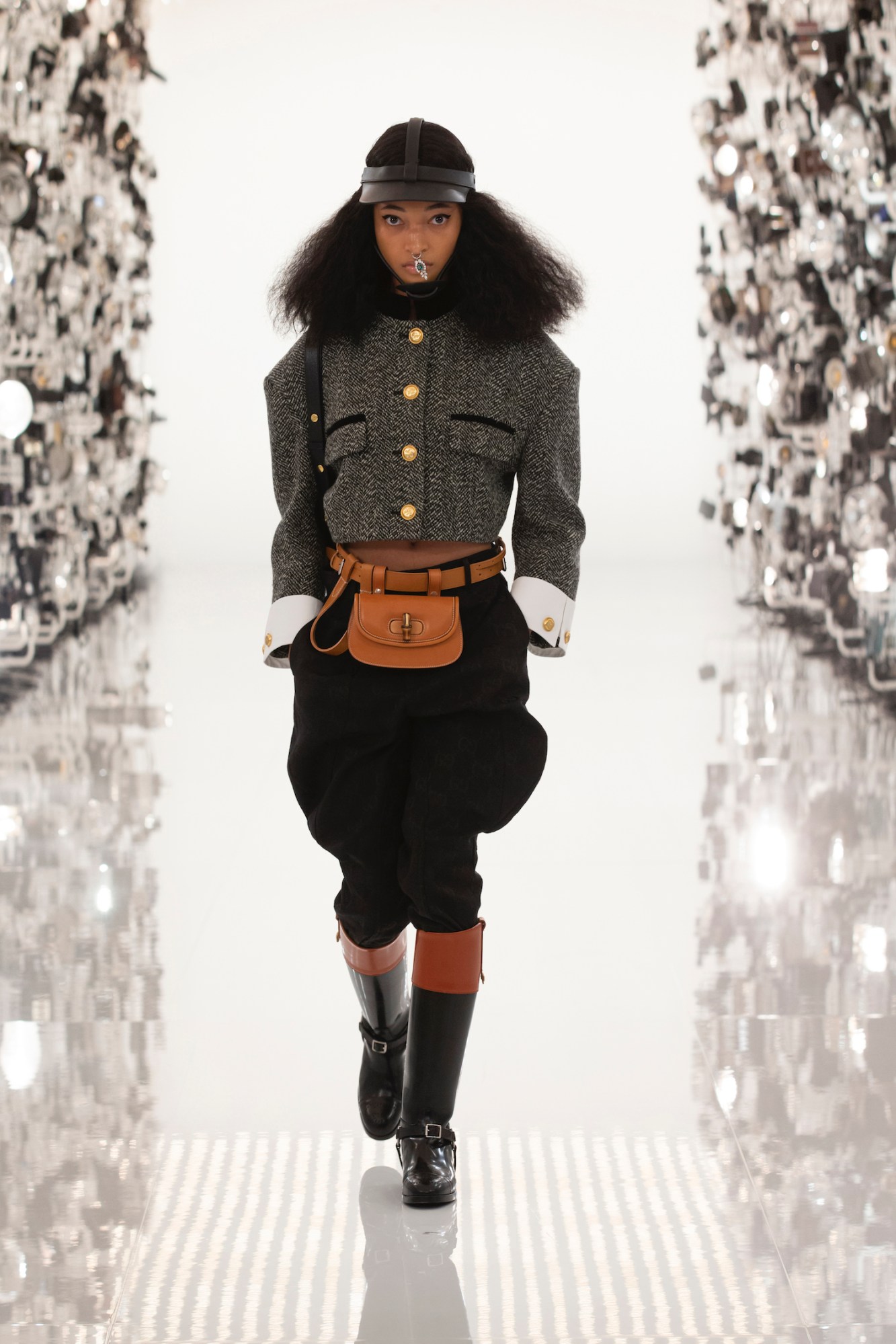 Model walking the runway in Gucci and Balenciaga's AW21 collaboration