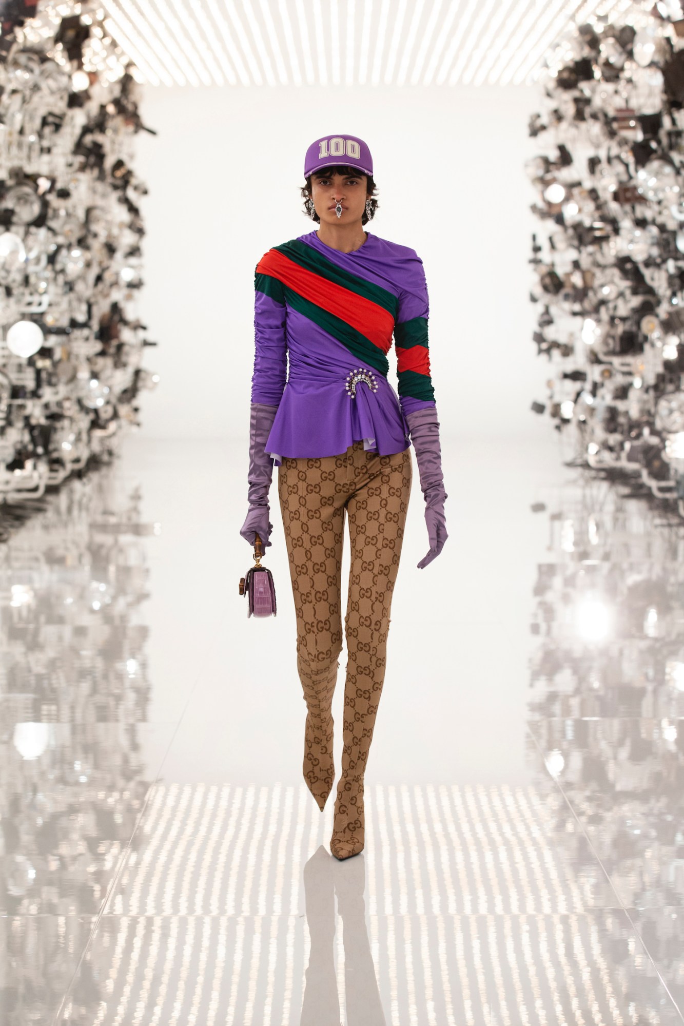 Model walking the runway in Gucci and Balenciaga's AW21 collaboration