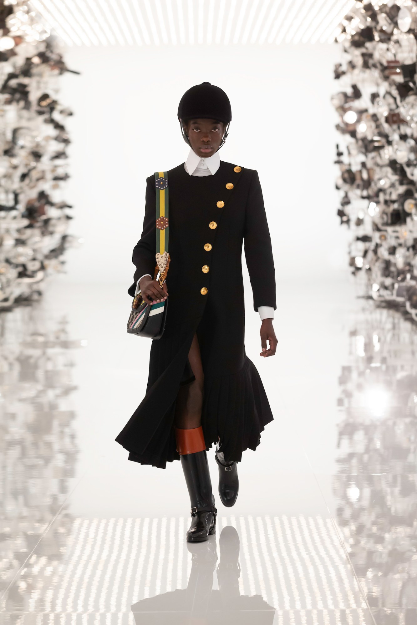 Model walking the runway in Gucci and Balenciaga's AW21 collaboration