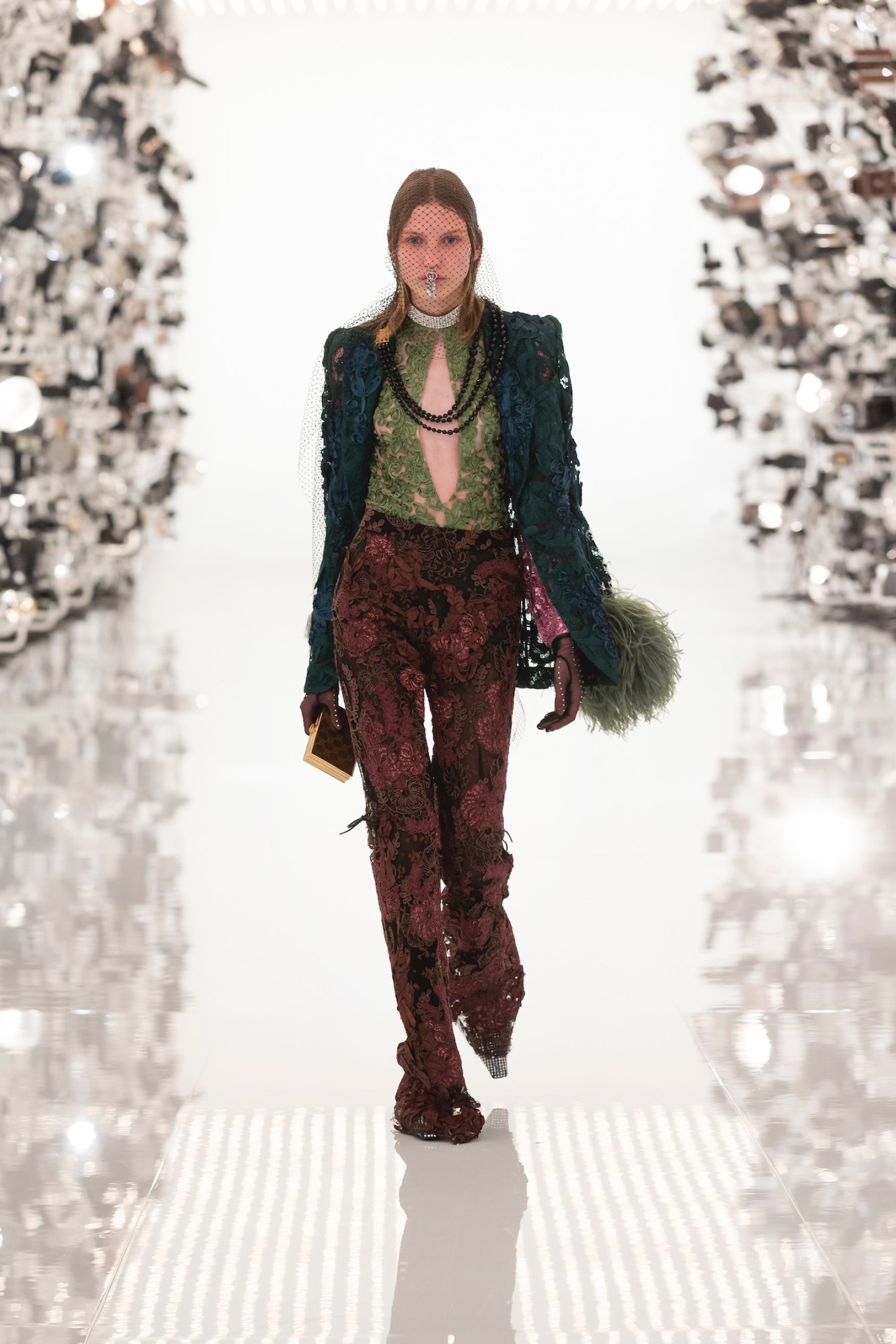 Model walking the runway in Gucci and Balenciaga's AW21 collaboration