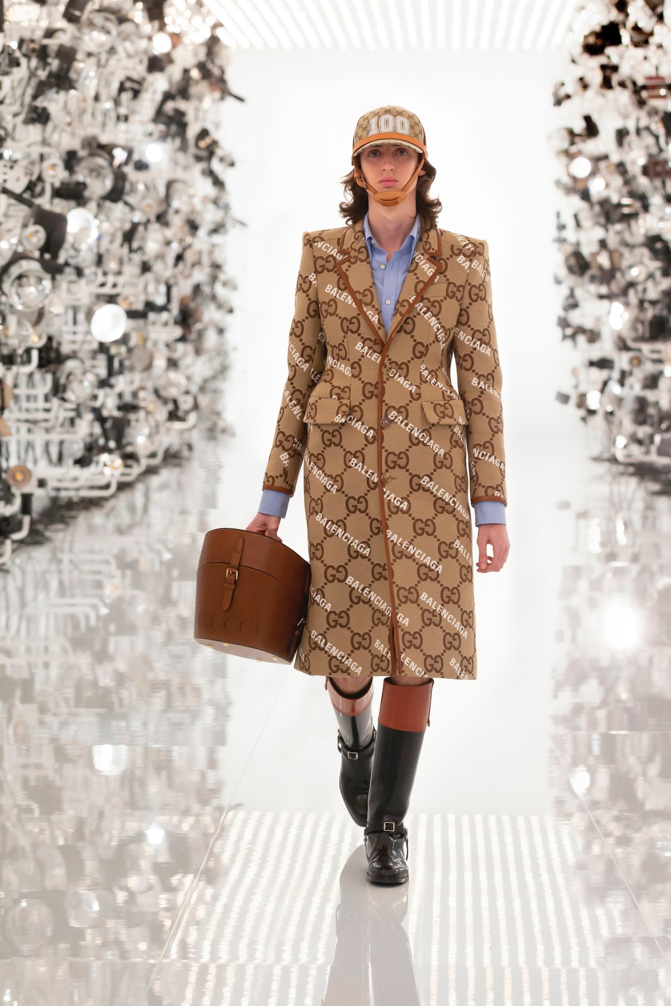 Model walking the runway in Gucci and Balenciaga's AW21 collaboration