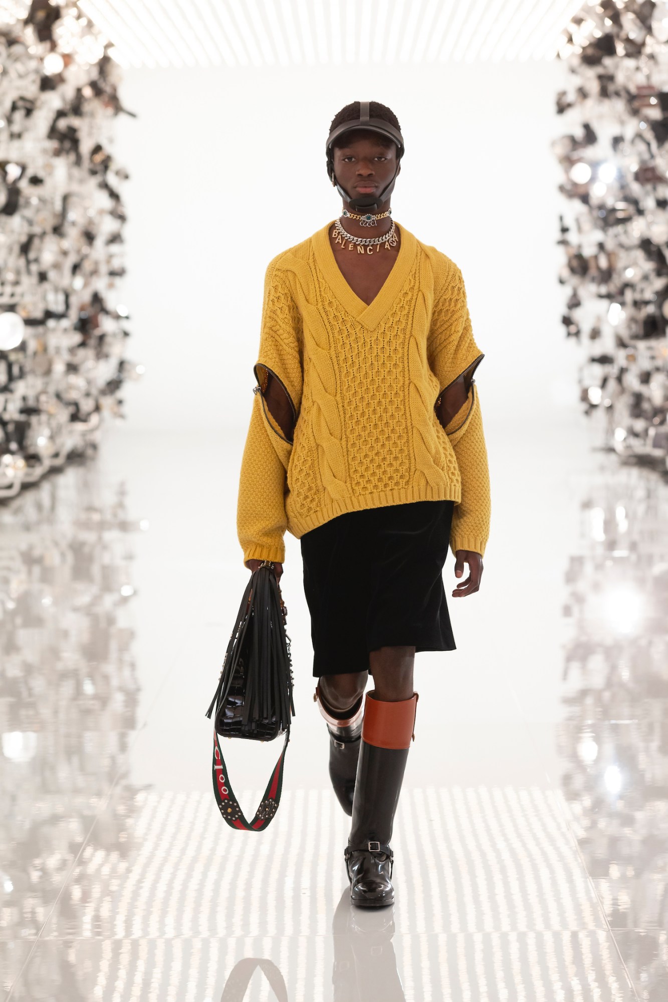 Model walking the runway in Gucci and Balenciaga's AW21 collaboration