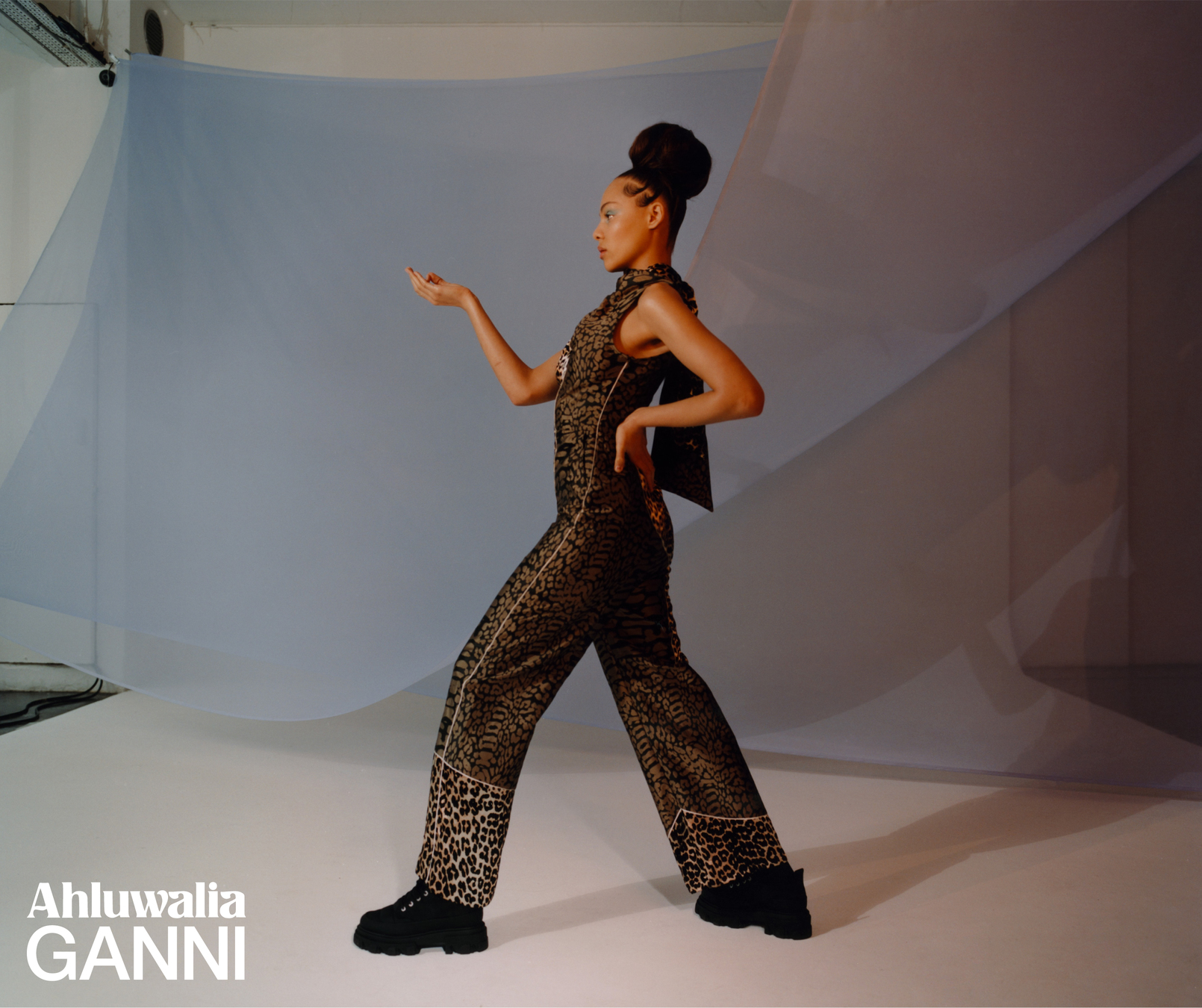 A model wearing an animal print look from the Ahluwalia x Ganni collaboration collection