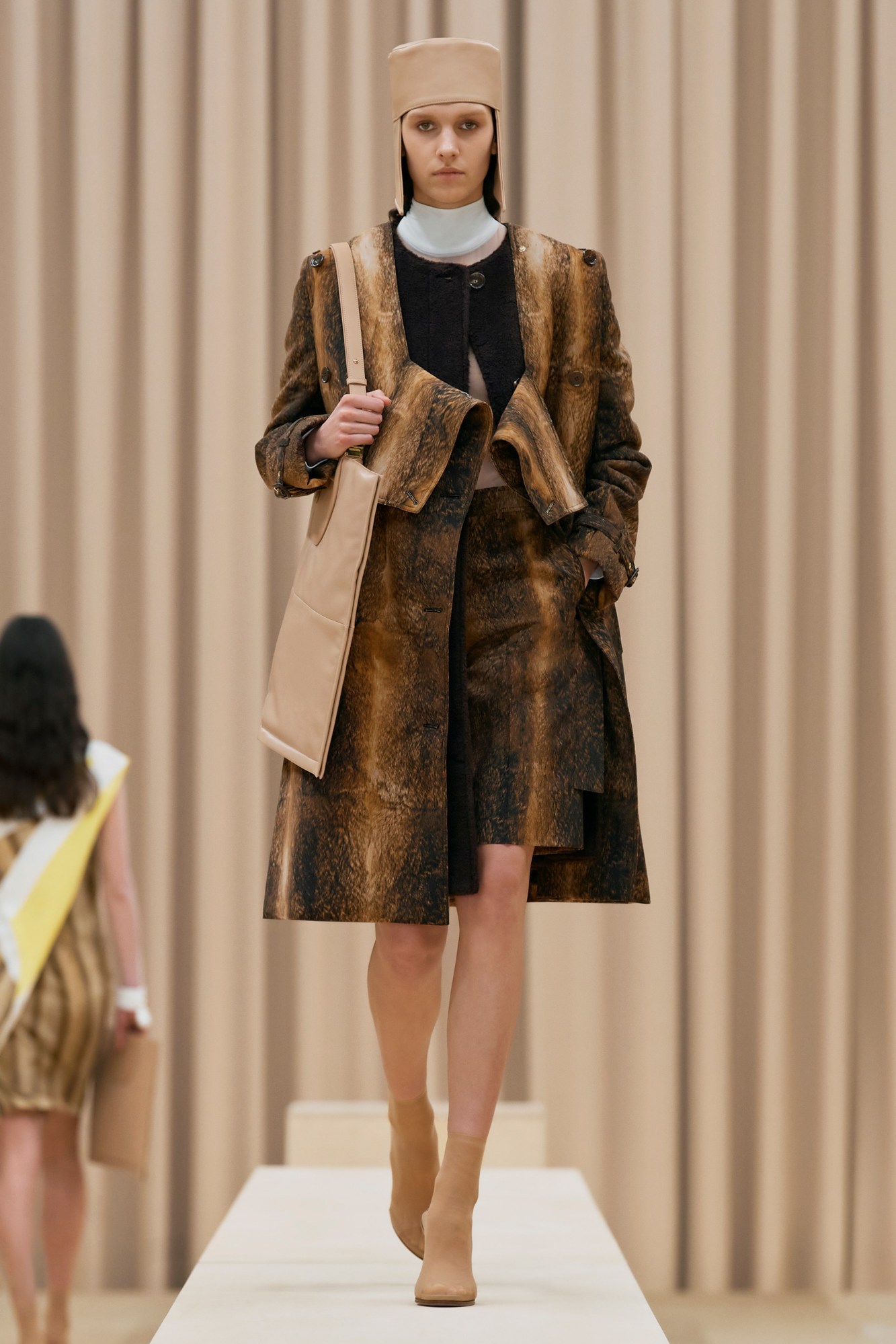 A model walking the runway in Burberry's AW21 womenswear show