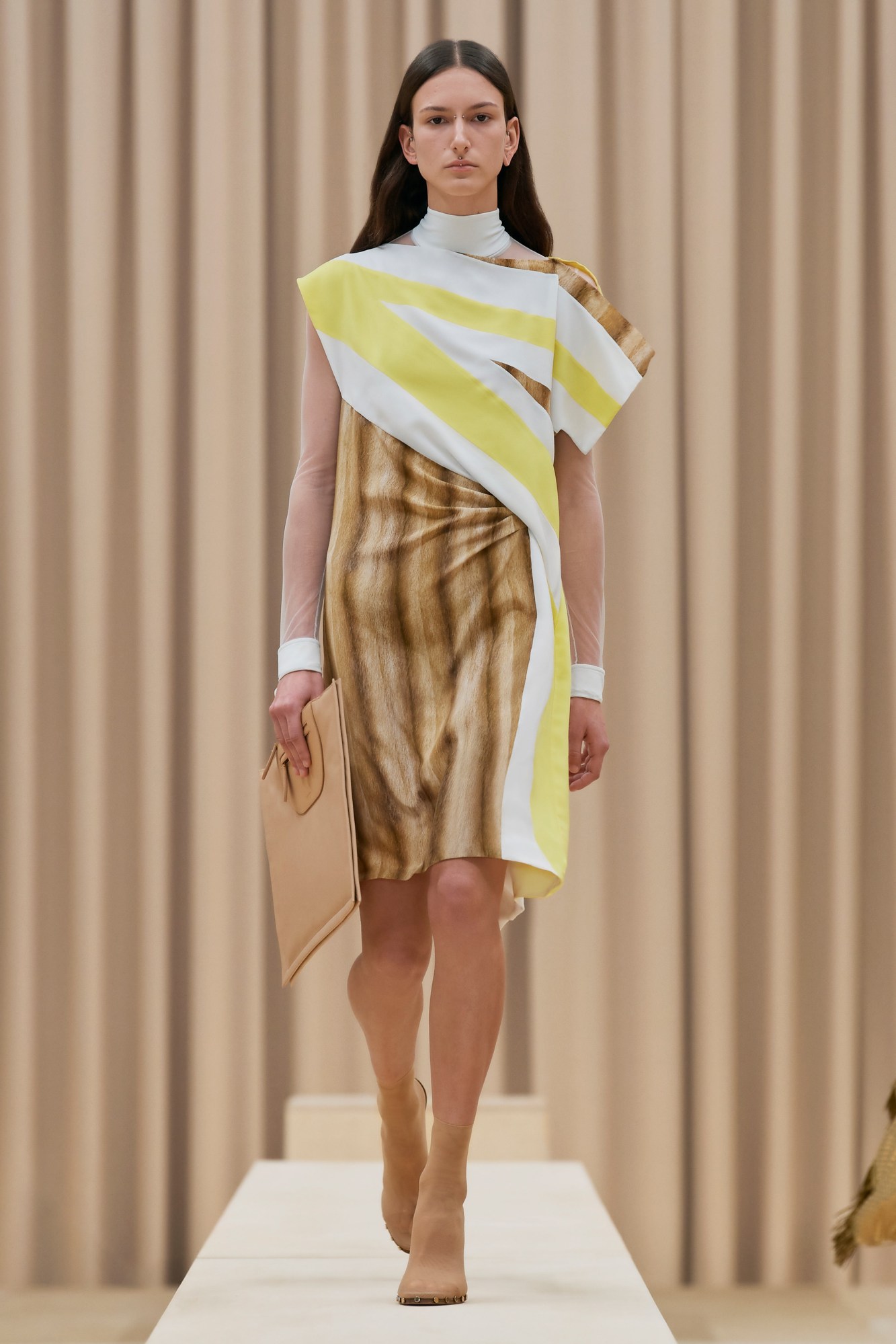 A model walking the runway in Burberry's AW21 womenswear show