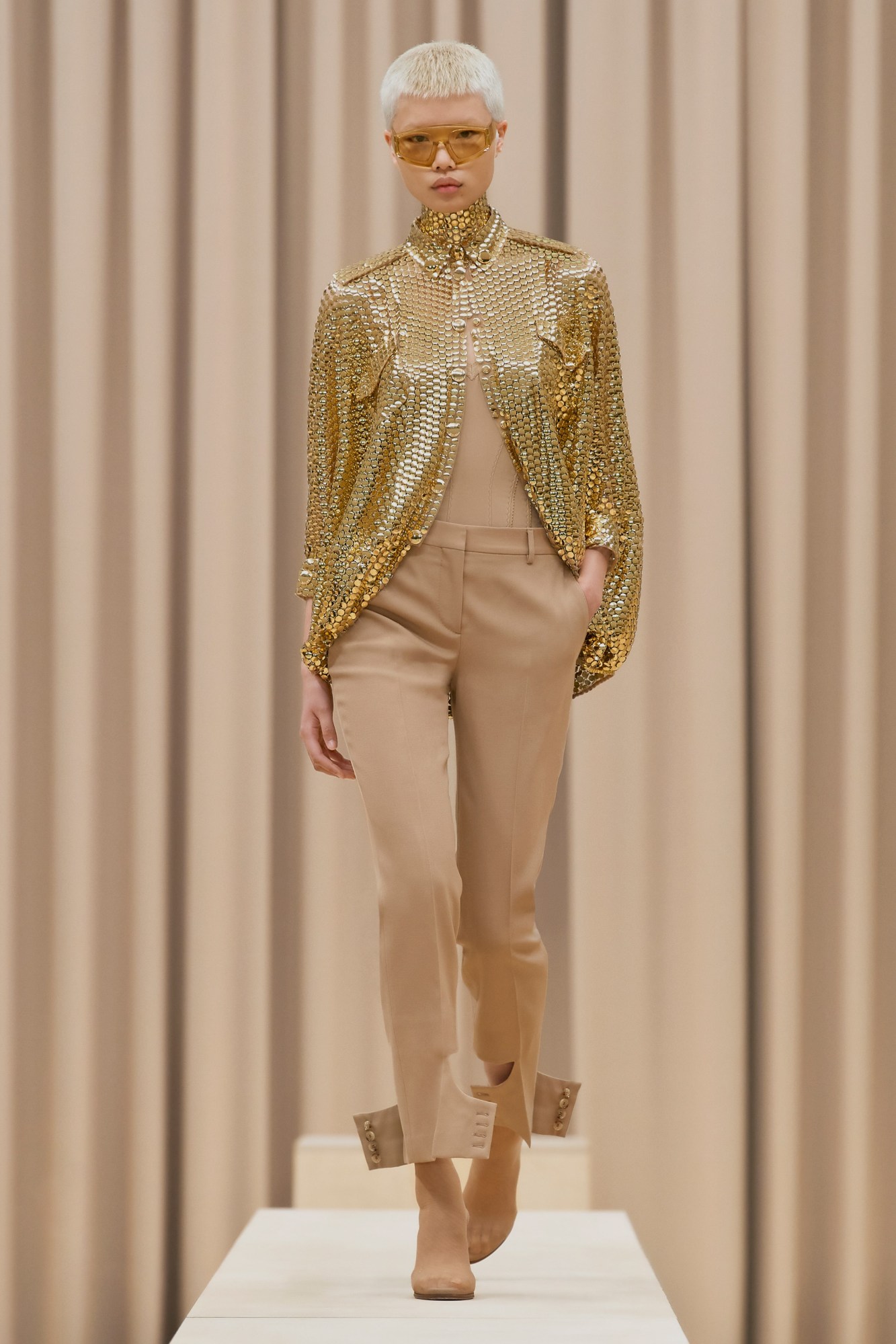 A model walking the runway in Burberry's AW21 womenswear show