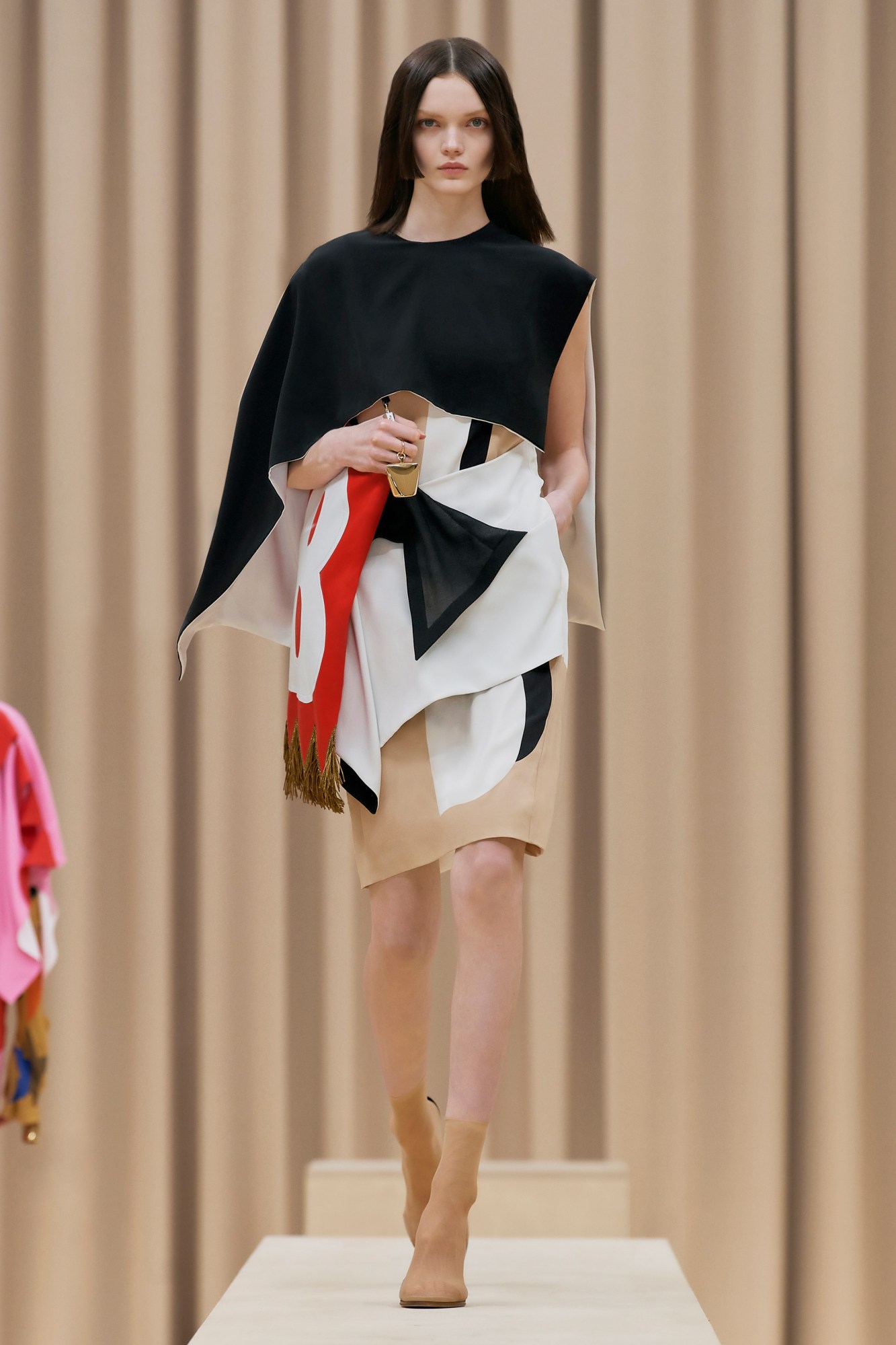 A model walking the runway in Burberry's AW21 womenswear show