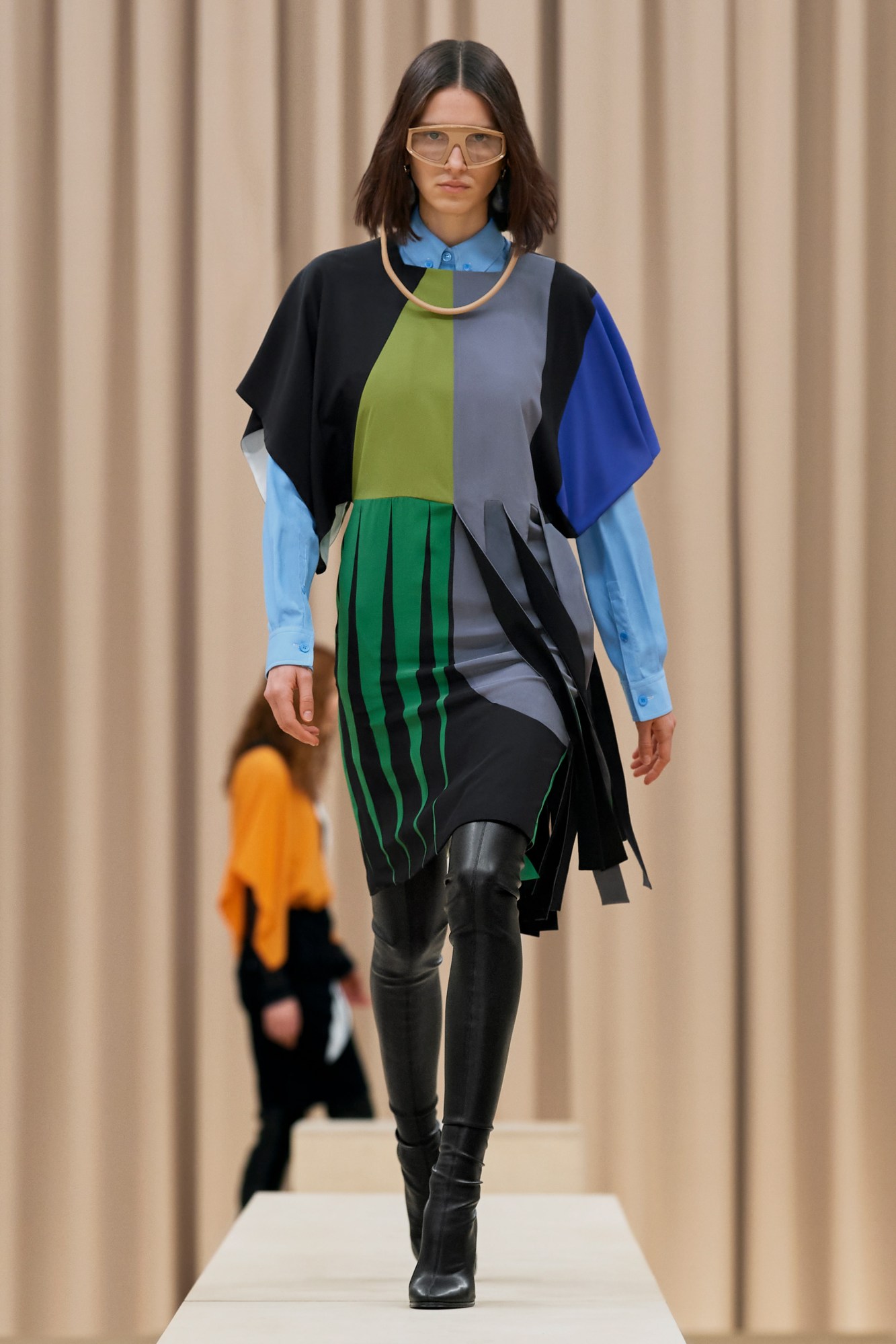 A model walking the runway in Burberry's AW21 womenswear show