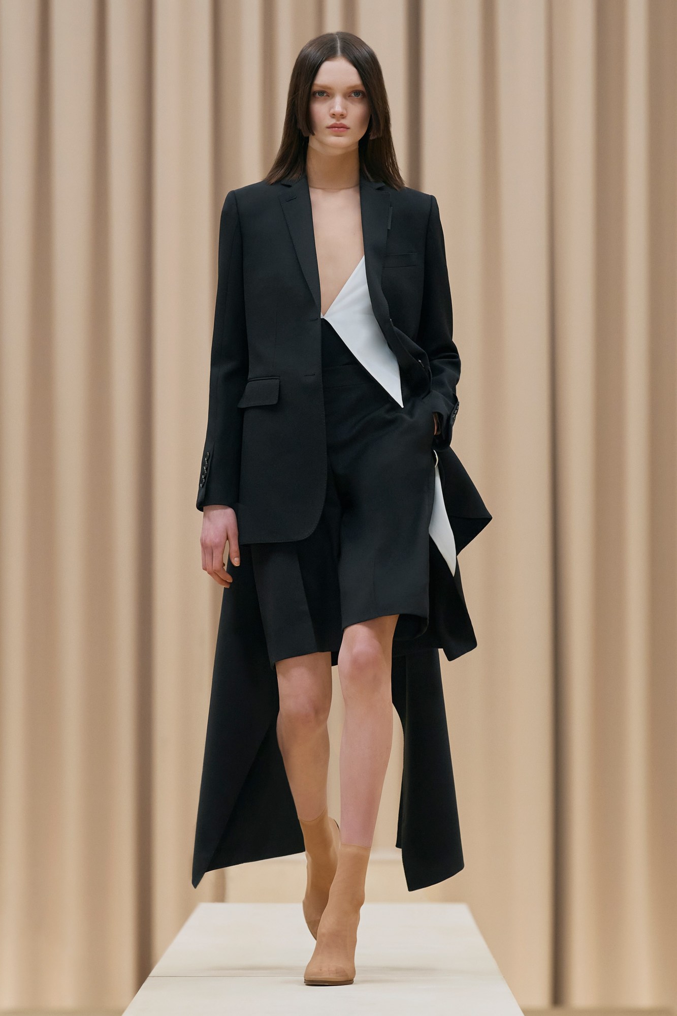 A model walking the runway in Burberry's AW21 womenswear show