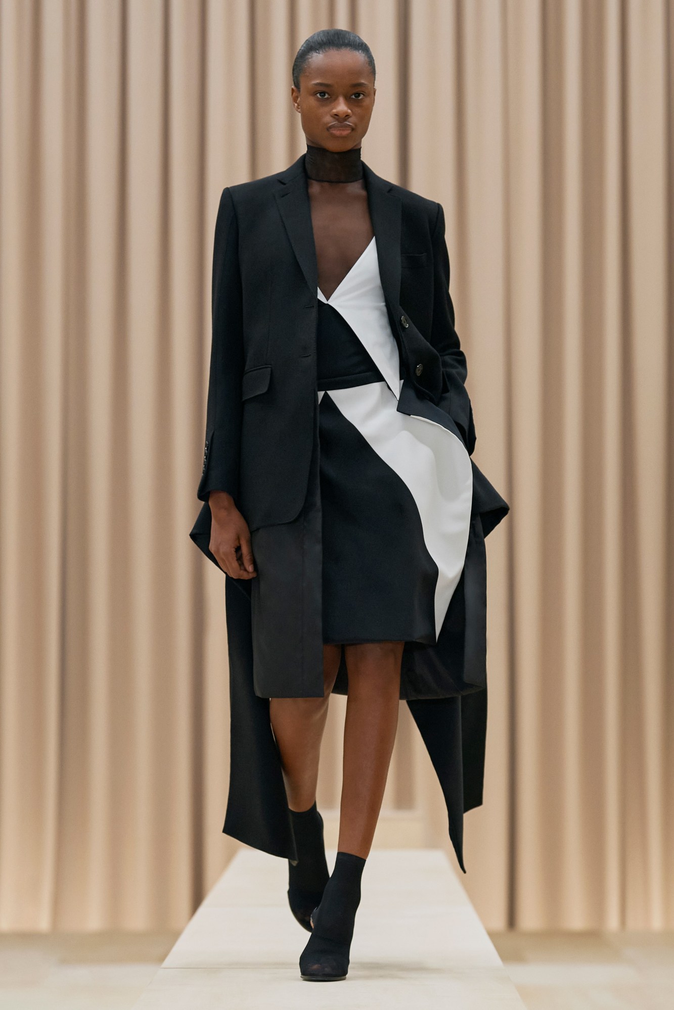 A model walking the runway in Burberry's AW21 womenswear show