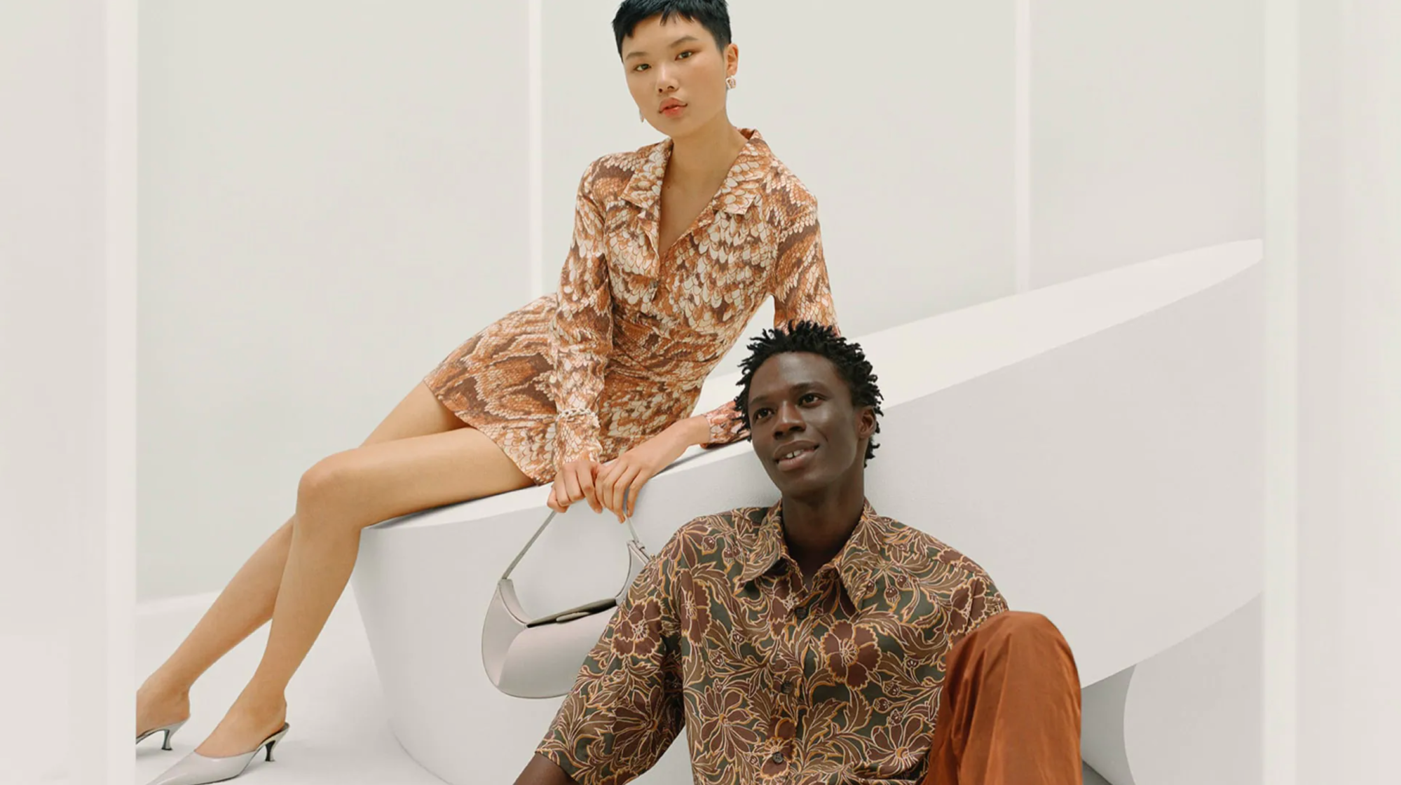 2 models wearing shades of brown for Farfetch