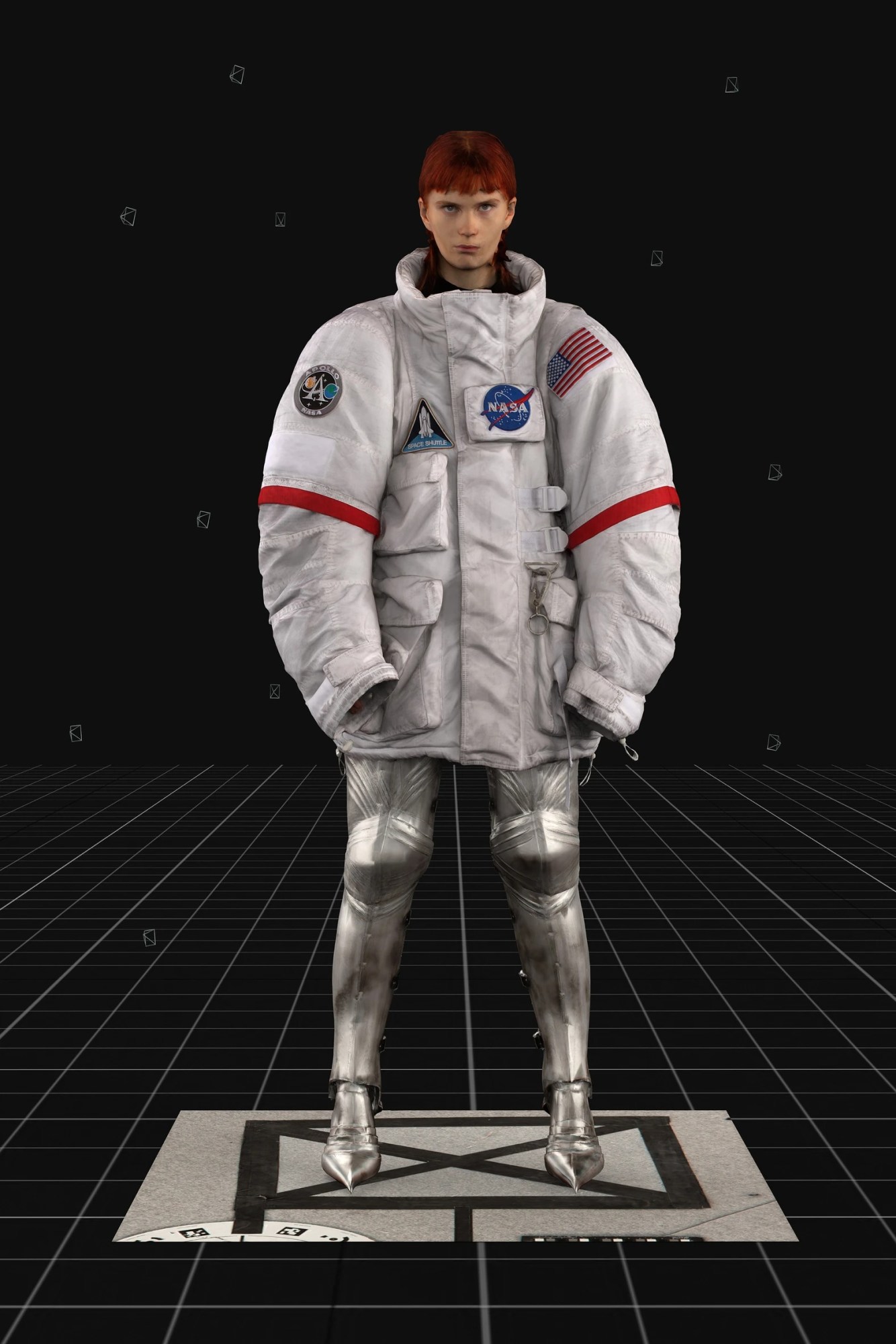 A video-game rendered model wears a spacesuit-inspired jacket and coat of armour boots by Balenciaga