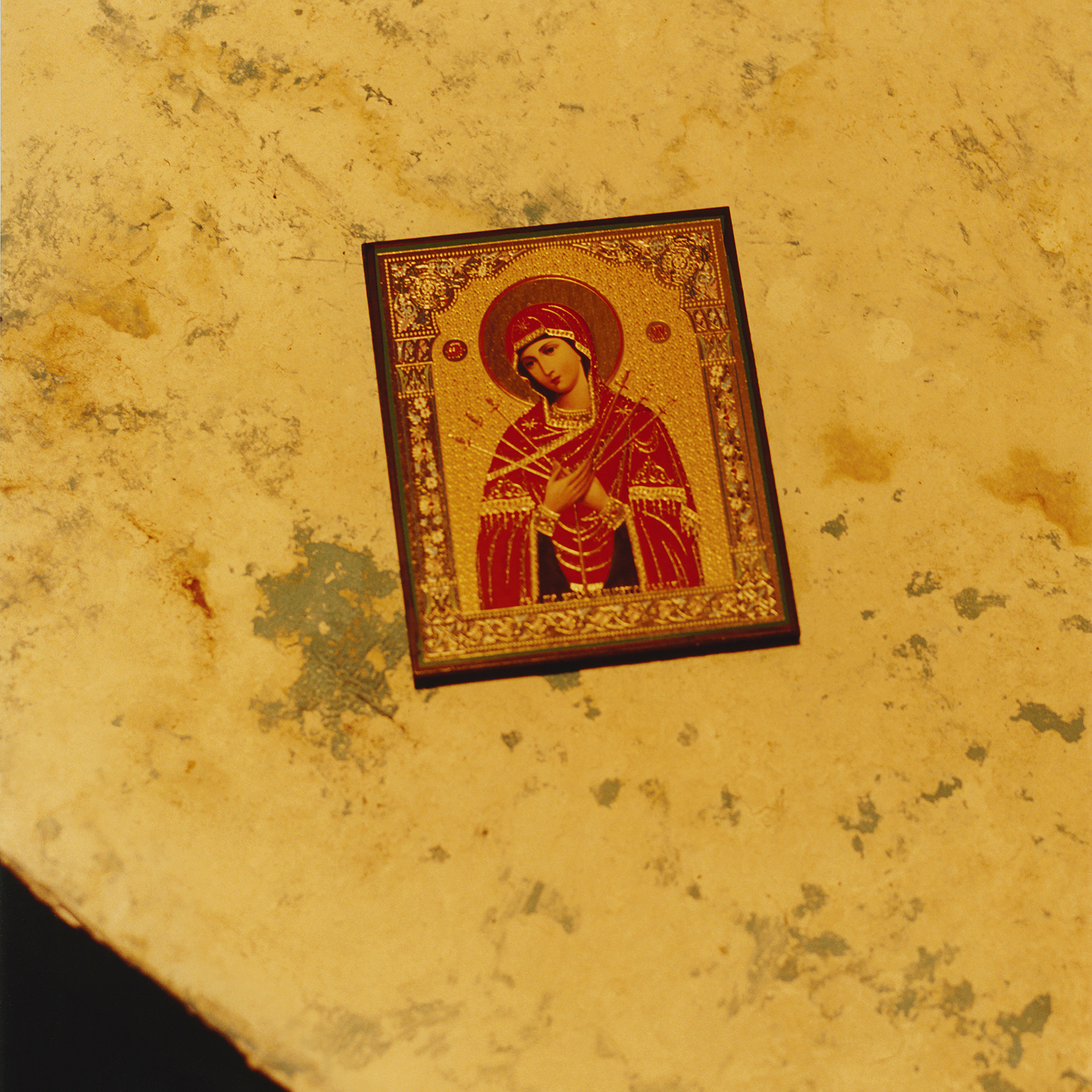 a religious painting on a small wooden panel likely associated with the Eastern Church