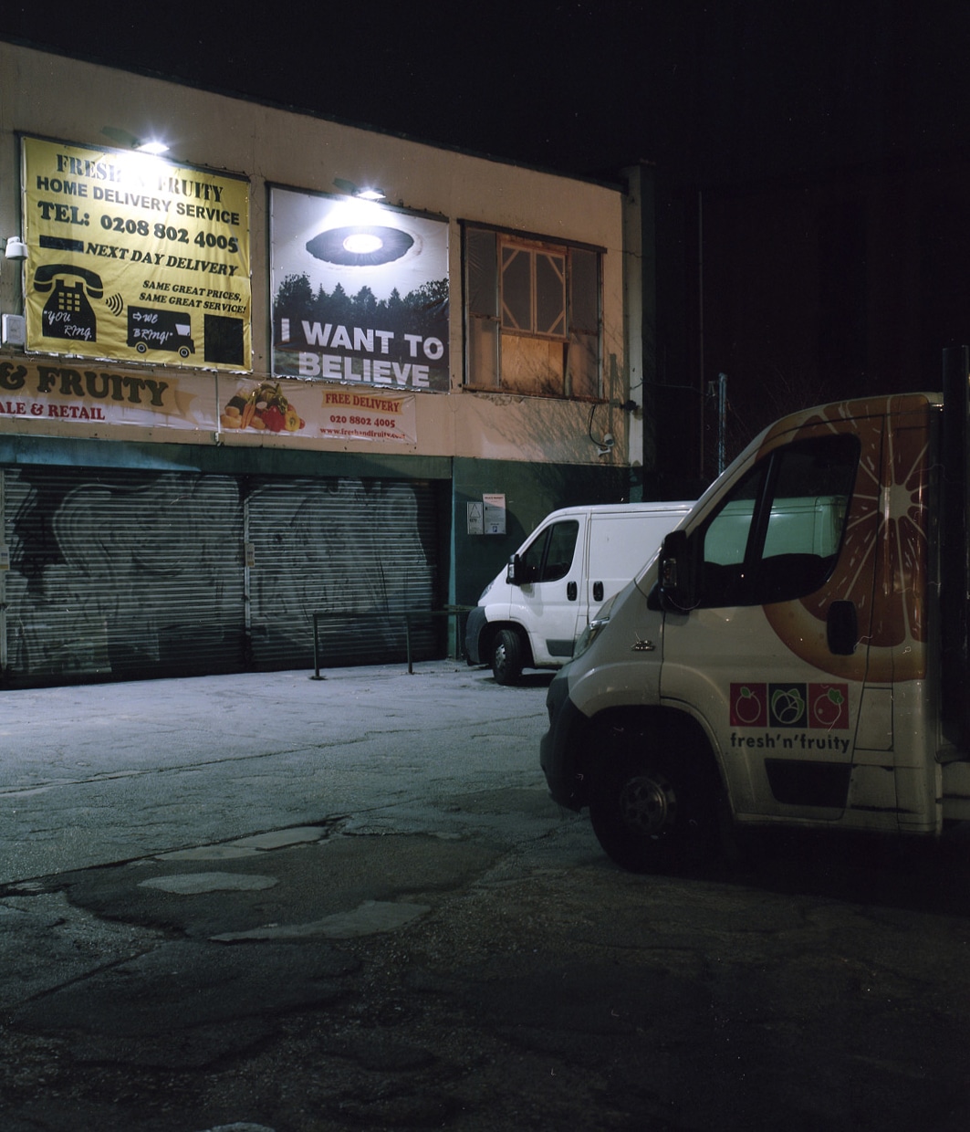 vans in a dark carpark