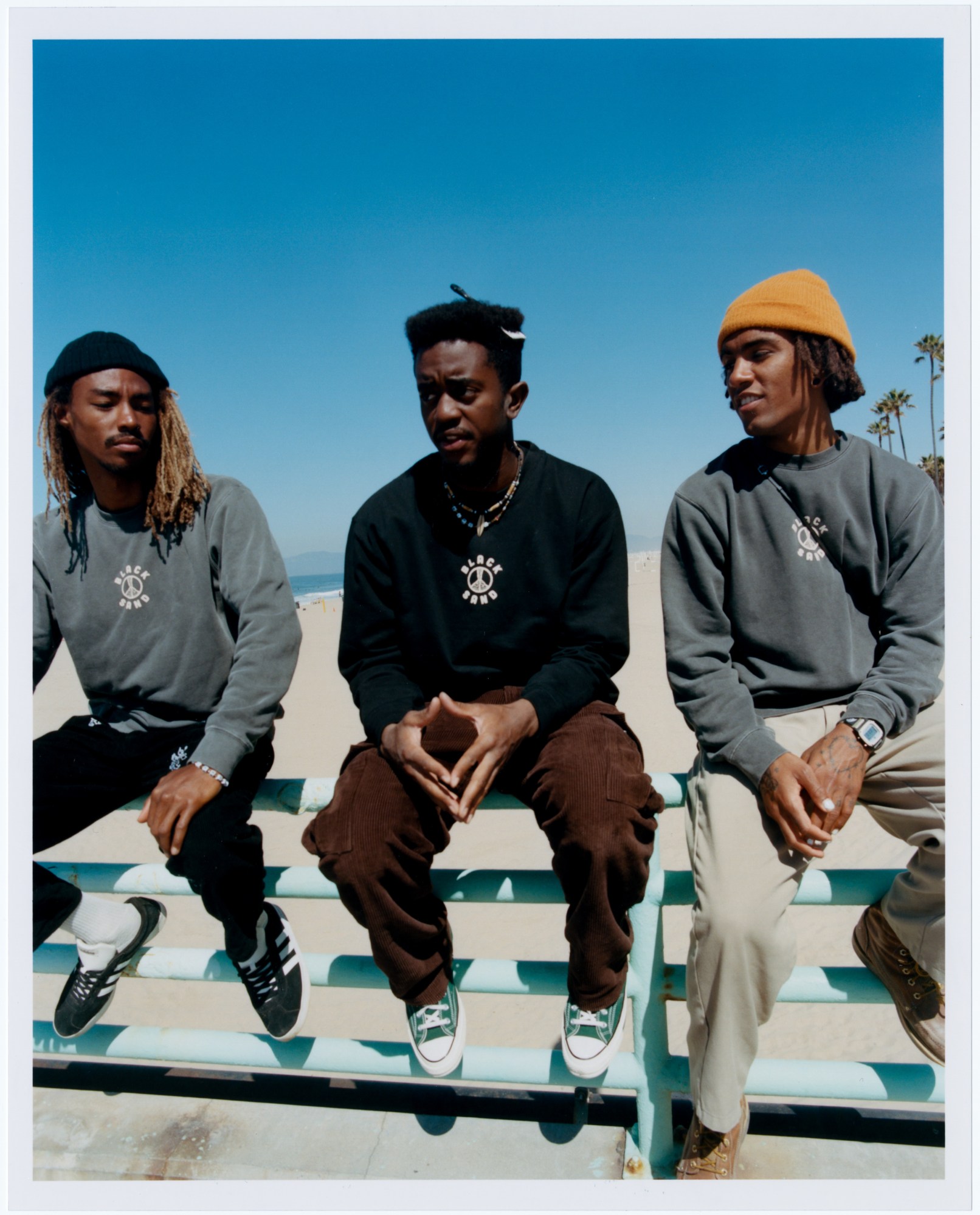 members of black sand surf collective photographed at the beach by daniel regan