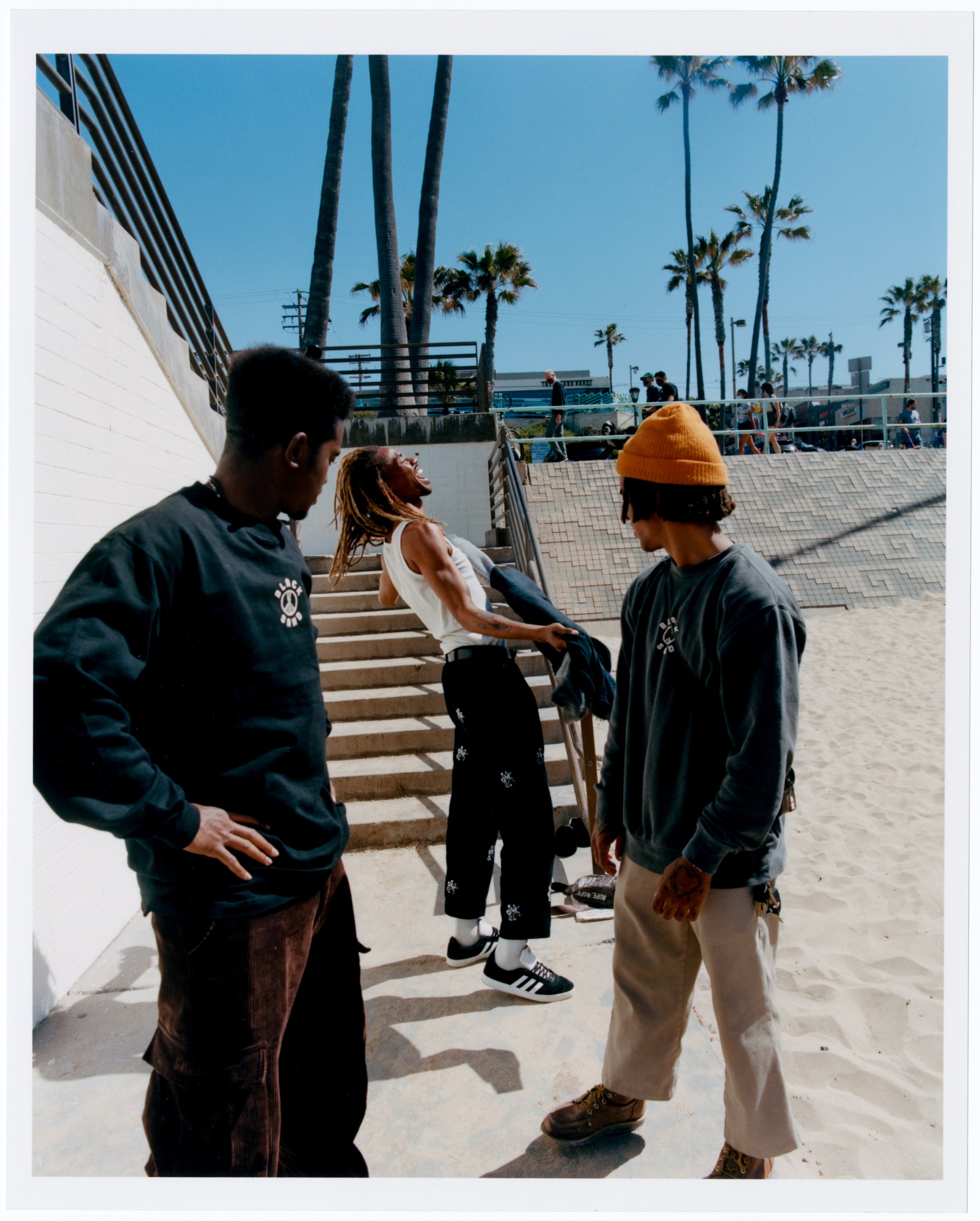 members of black sand surf collective photographed at the beach by daniel regan