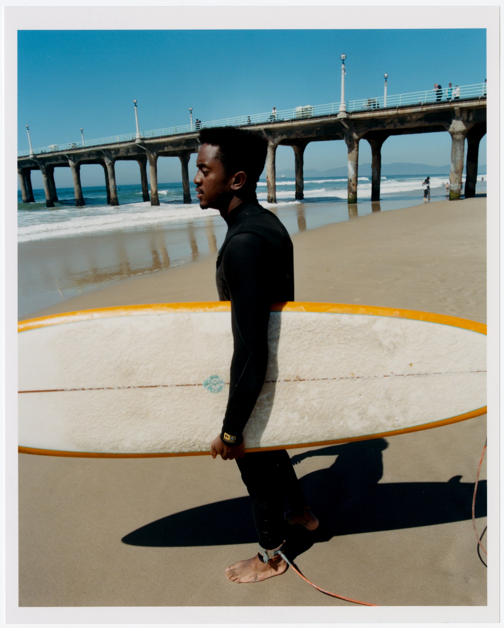 members of black sand surf collective photographed at the beach by daniel regan