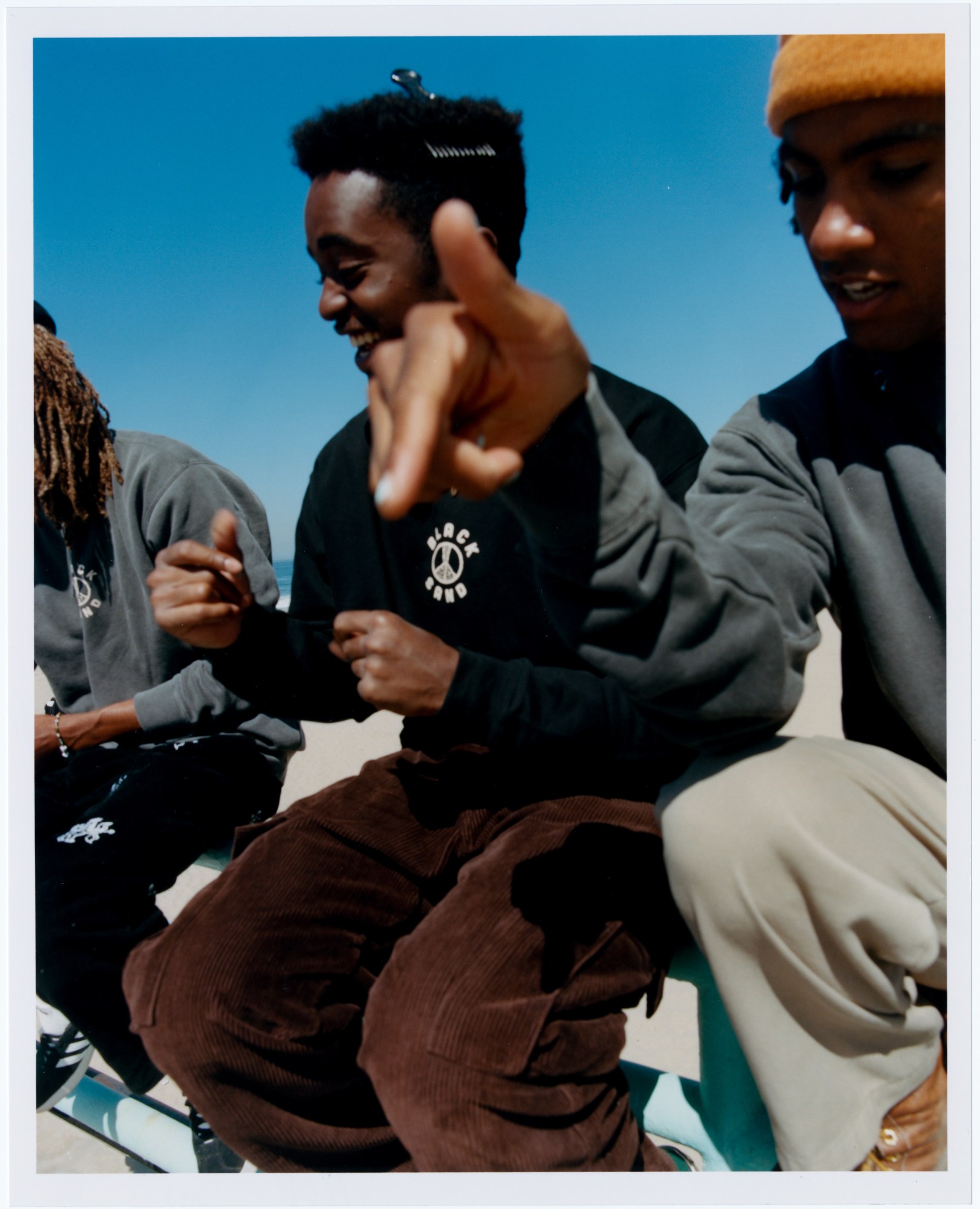 members of black sand surf collective photographed at the beach by daniel regan