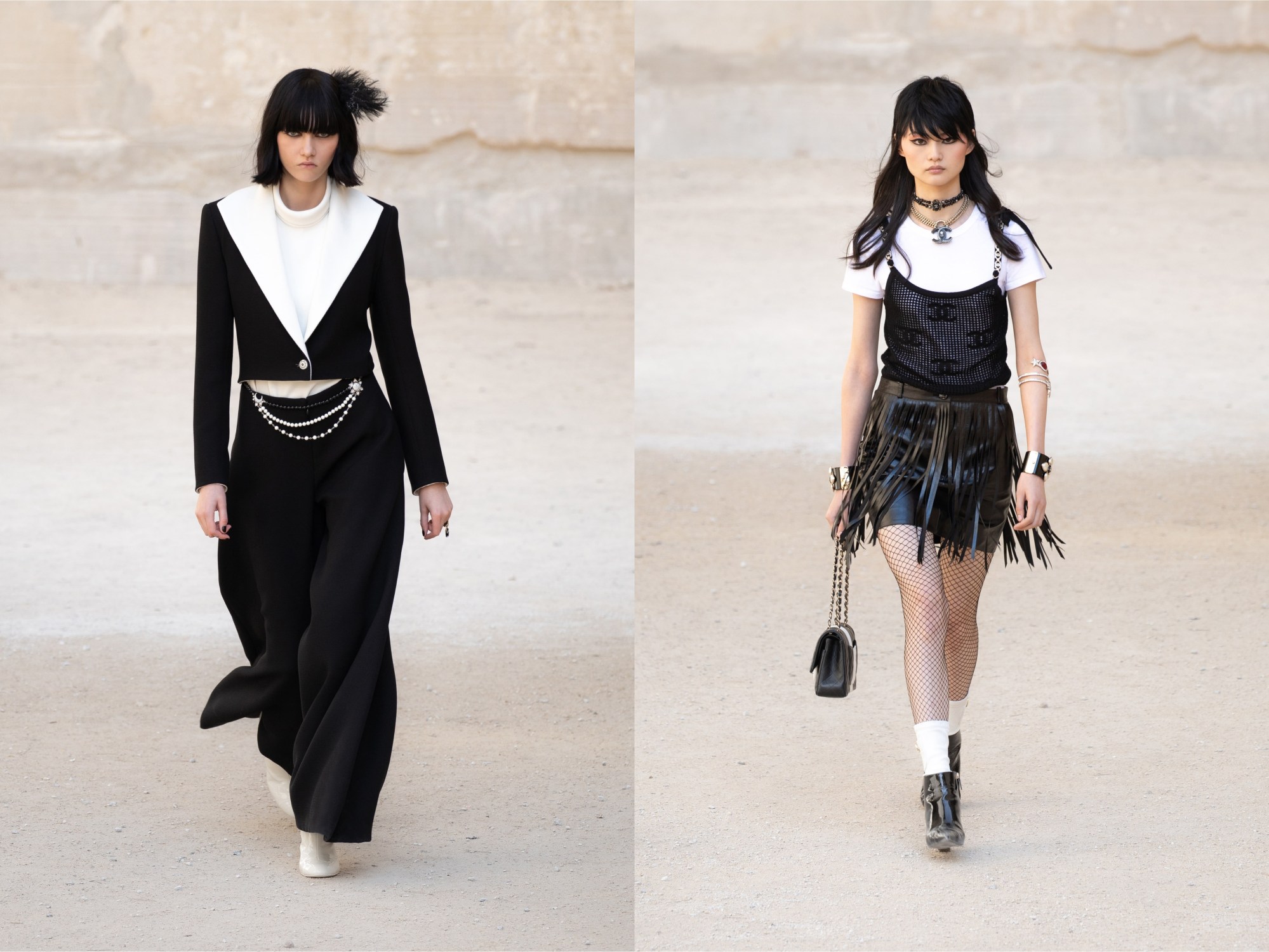 two models walk the runway in black and white punk-inspired Chanel cruise looks