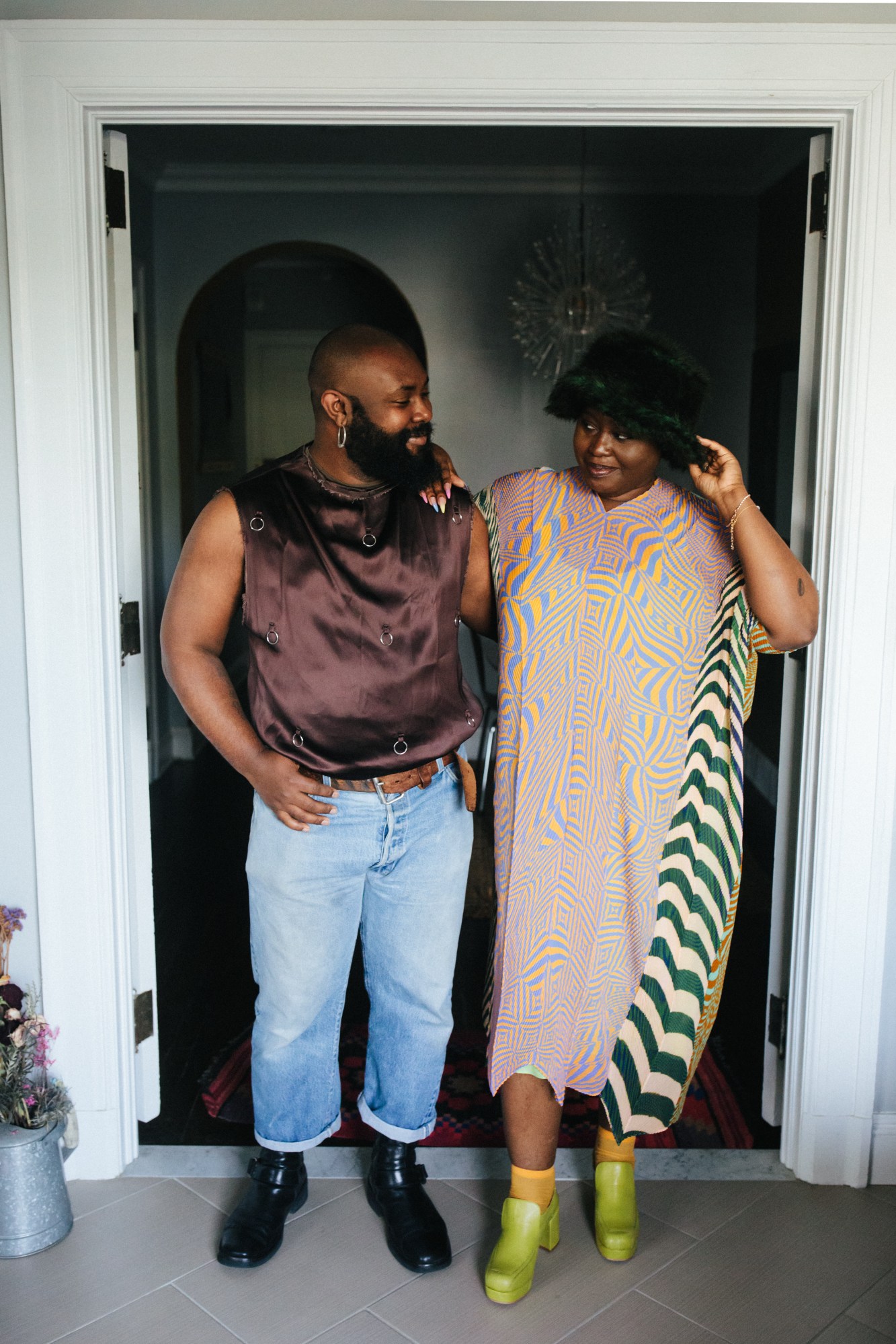 Zeba Blay and Keesean Moore standing in a door way