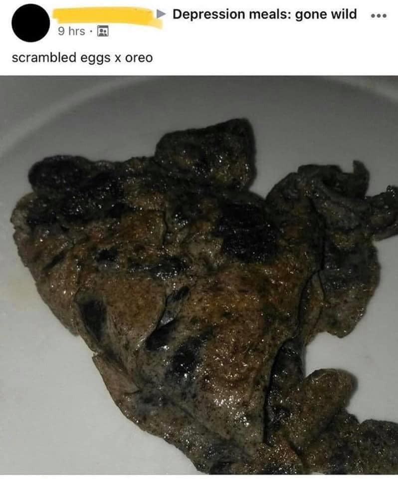 a black/brown coloured mess on a plate – apparently made from oreos and scrambled eggs