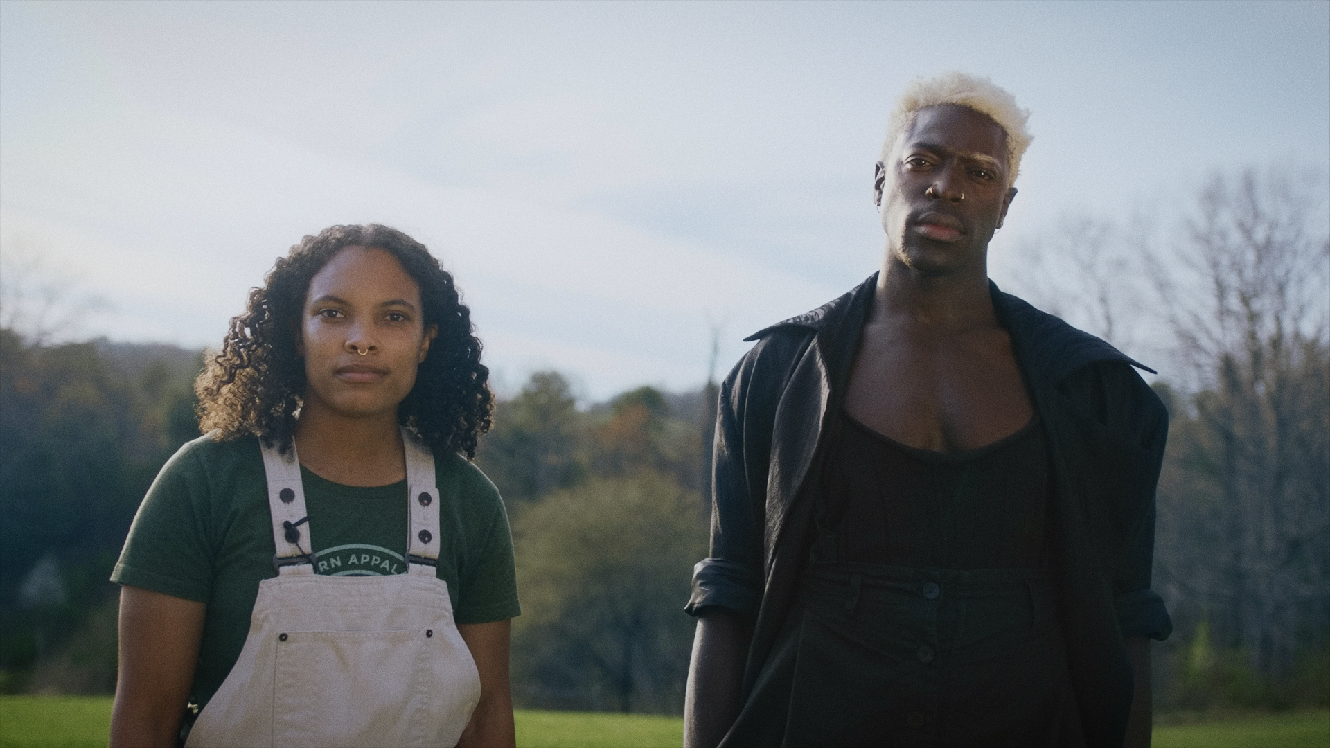 moses sumney and tamarya standing in a field in i-d film