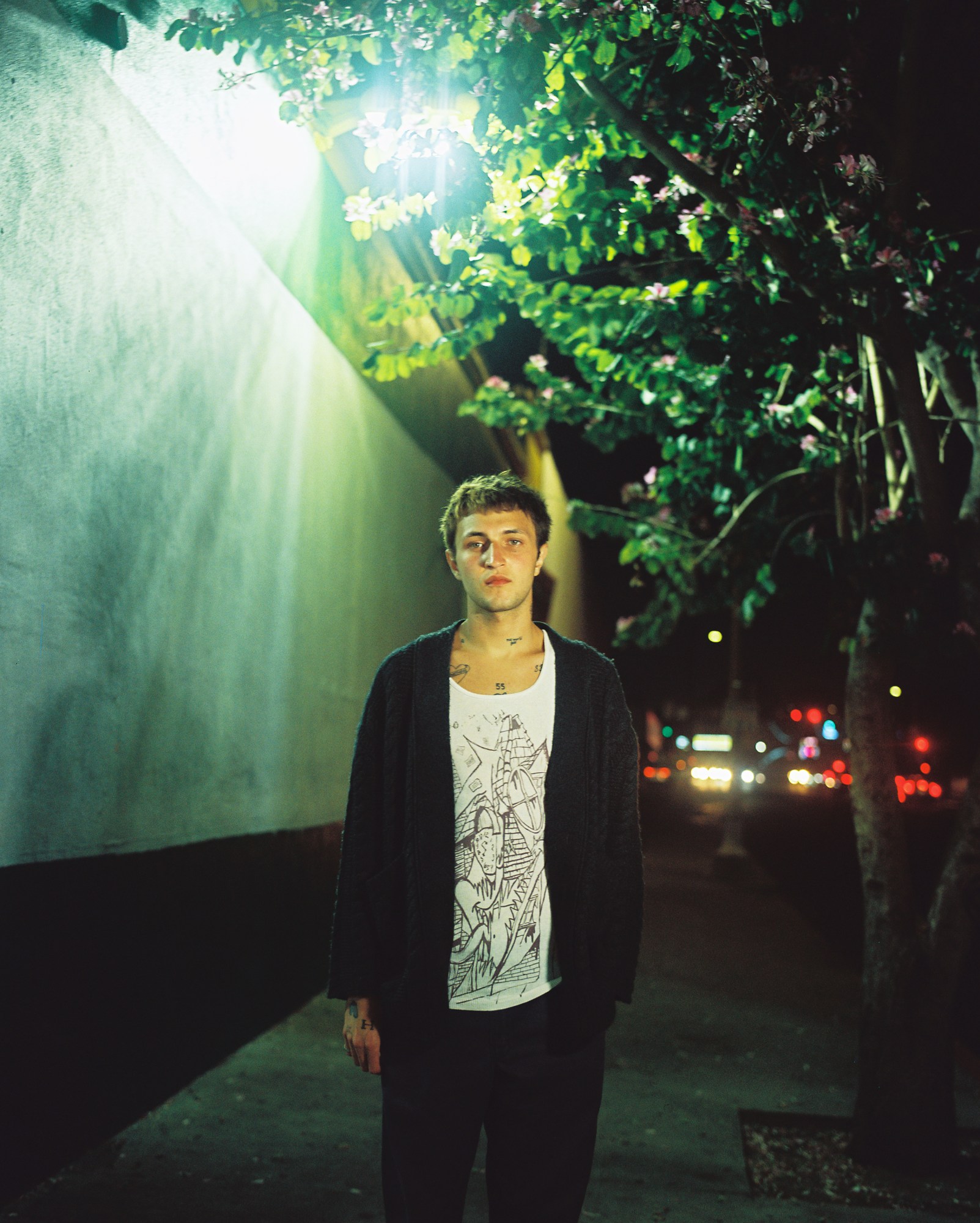 anwar hadid standing on a street in la at night