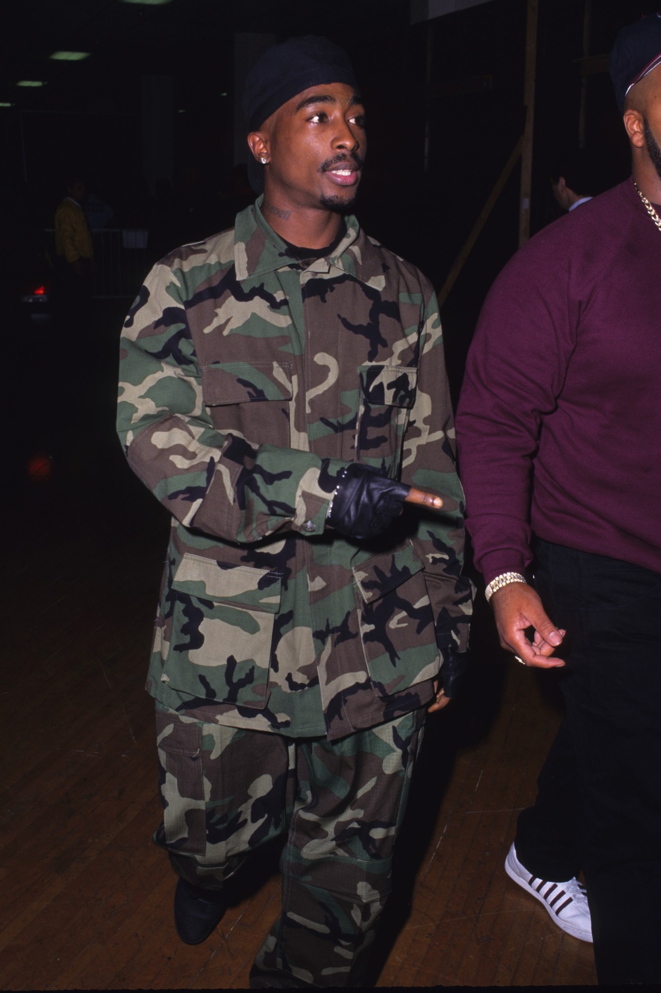 tupac arriving to the 1996 soul train music awards wearing army print