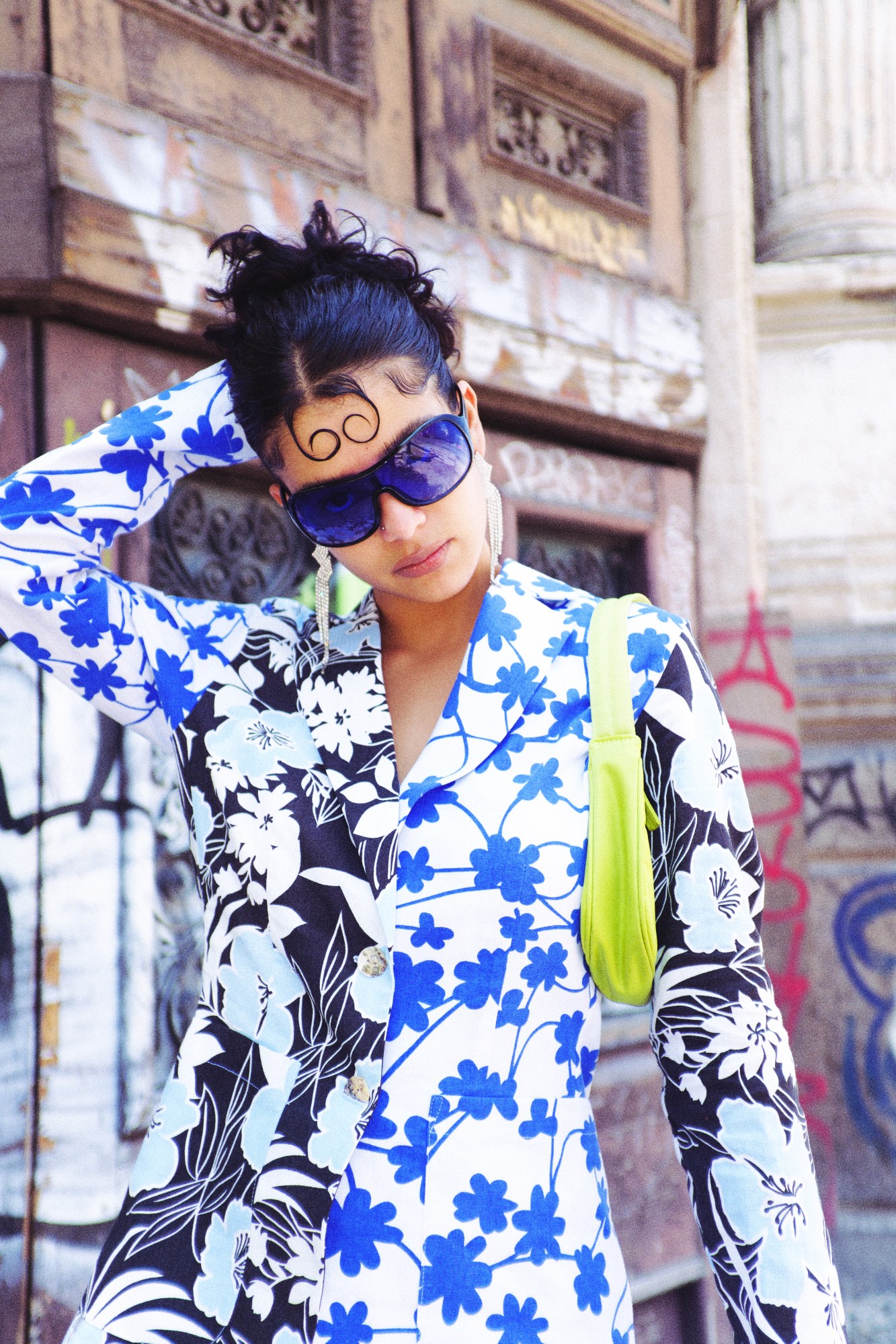 a model wearing bright colourful clothes by Katsu Clothing on the streets of Centro, Mexico City