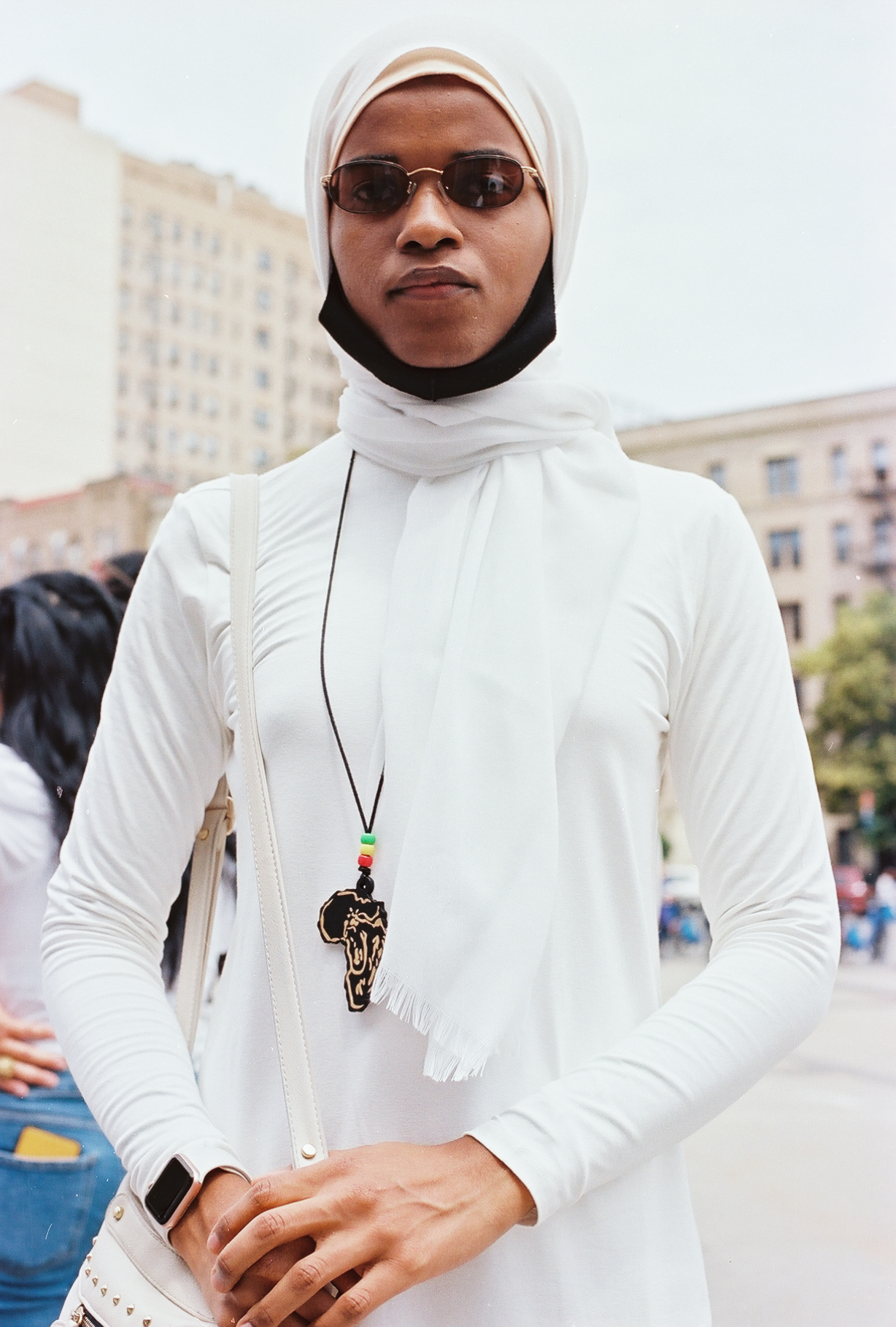 A person wearing all white at the Brooklyn Liberation march and rally.