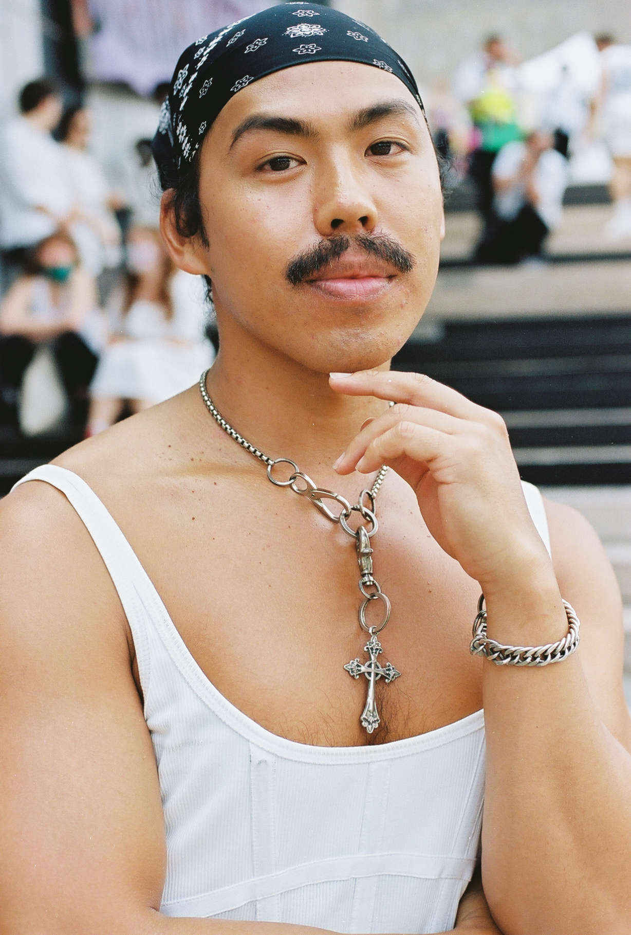 A person wearing a cross necklace at the Brooklyn Liberation rally.