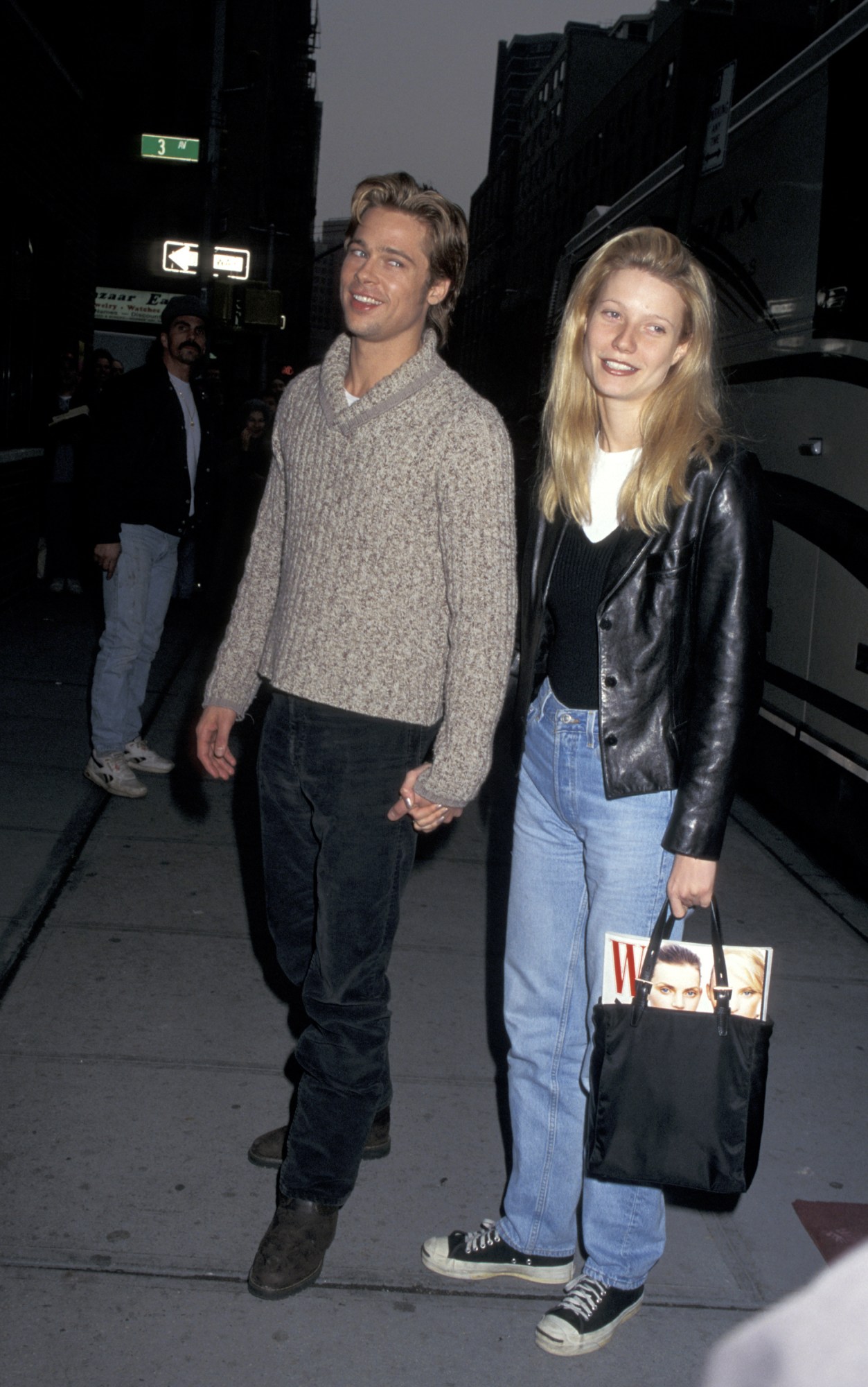 brad pitt and gwyneth paltrow holding hands on the sidewalk in nyc