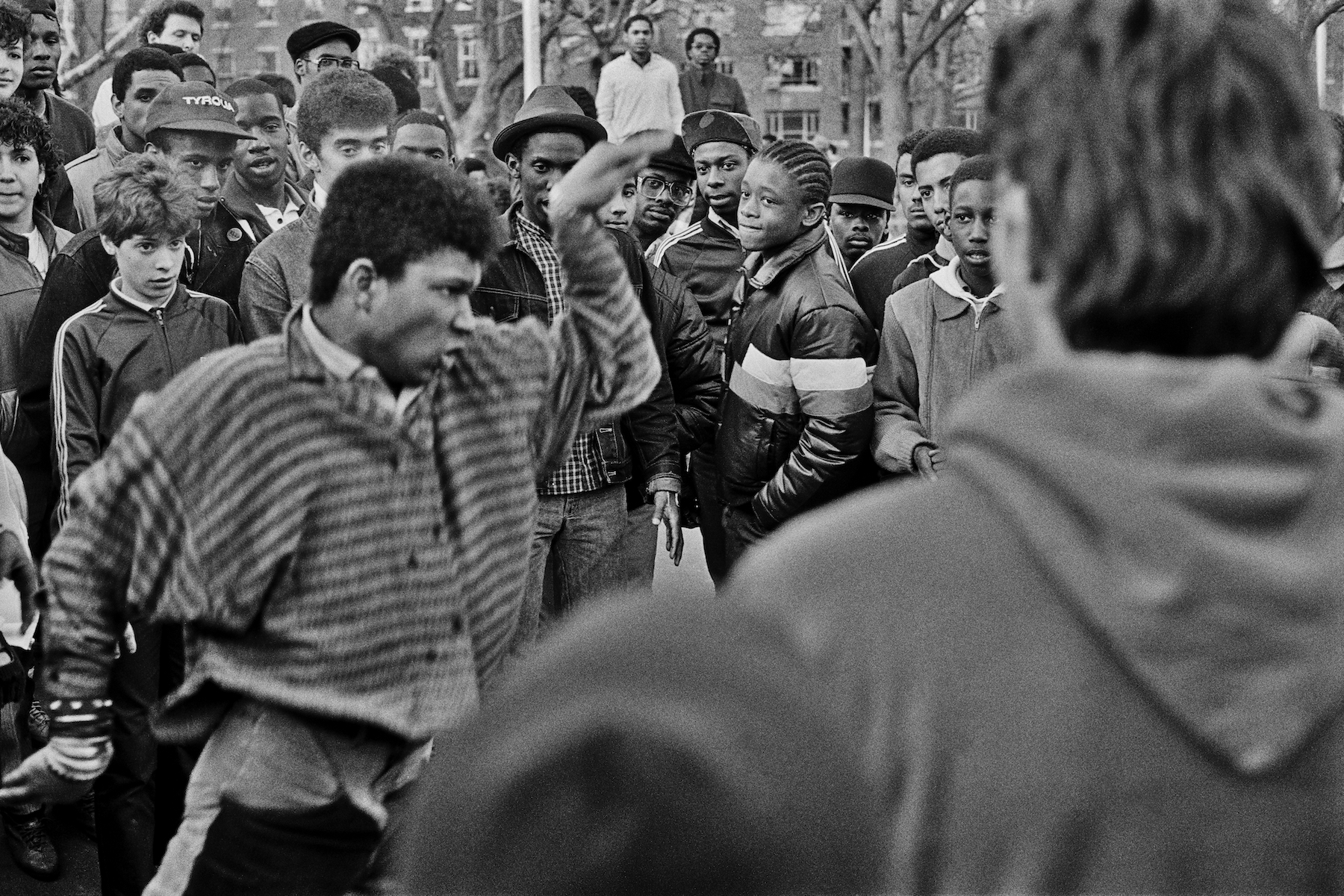 a young man in a crowd dancing