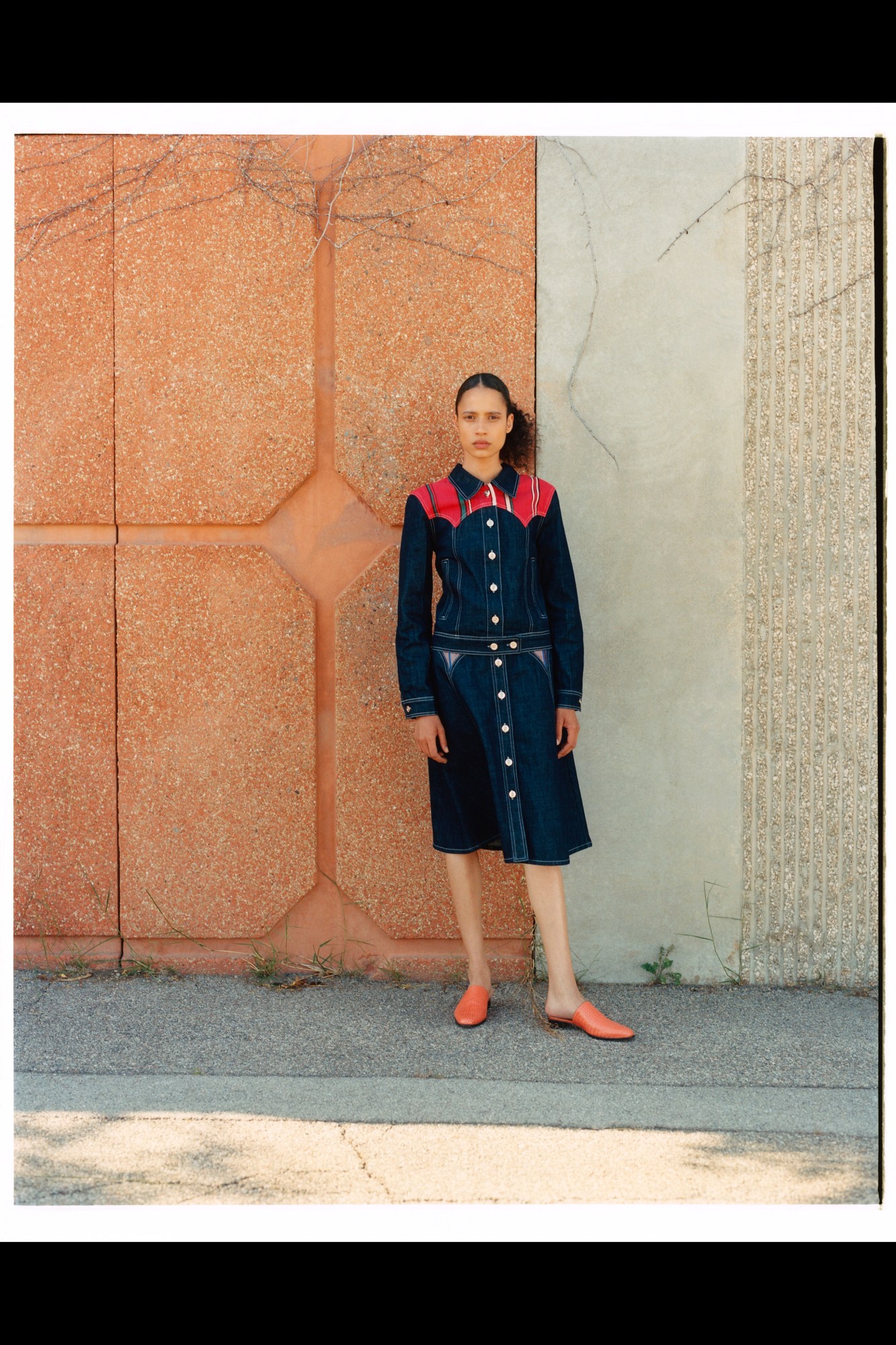 A model wearing a full look from Wales Bonner's SS22 collection