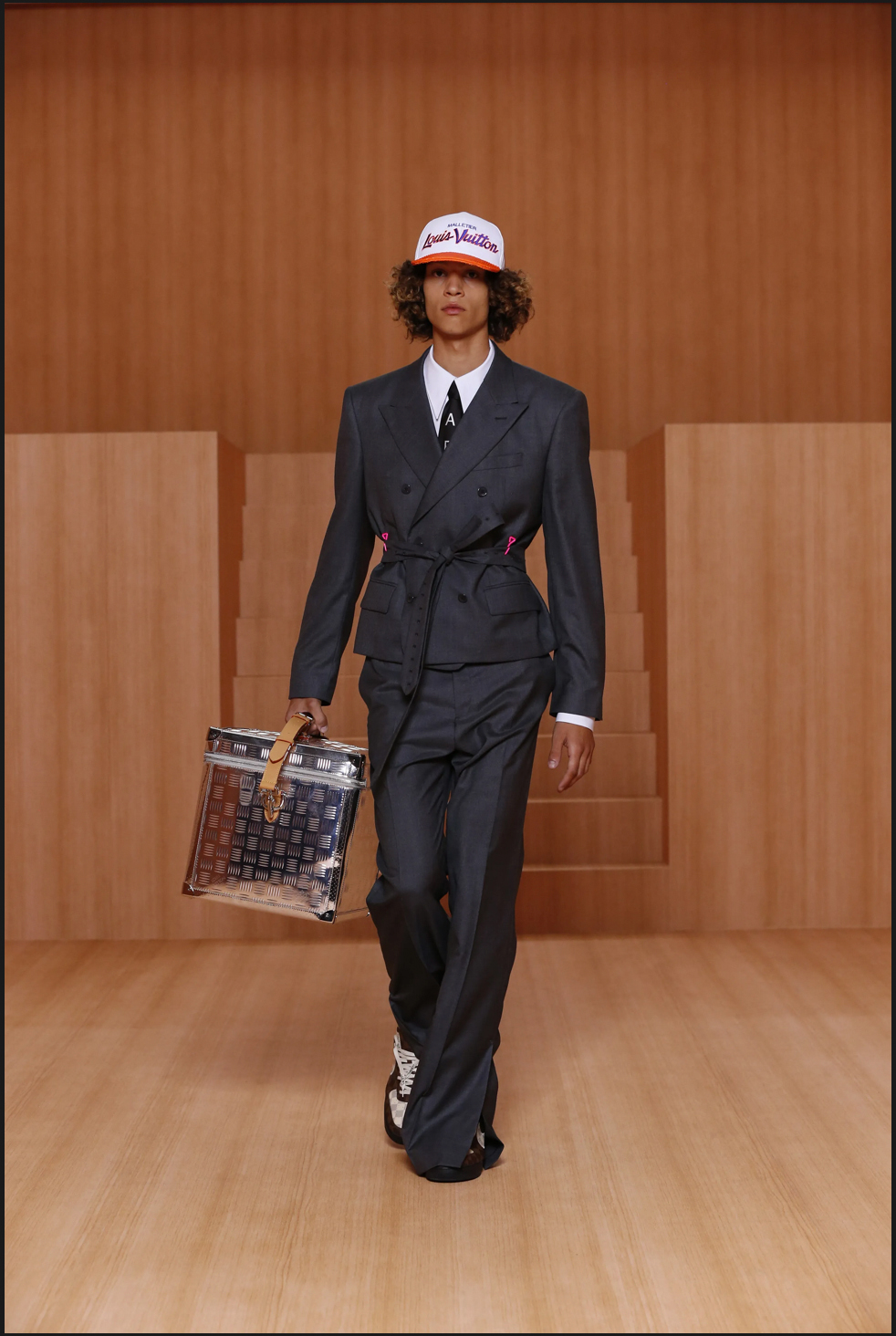 a model wearing Louis Vuitton S22