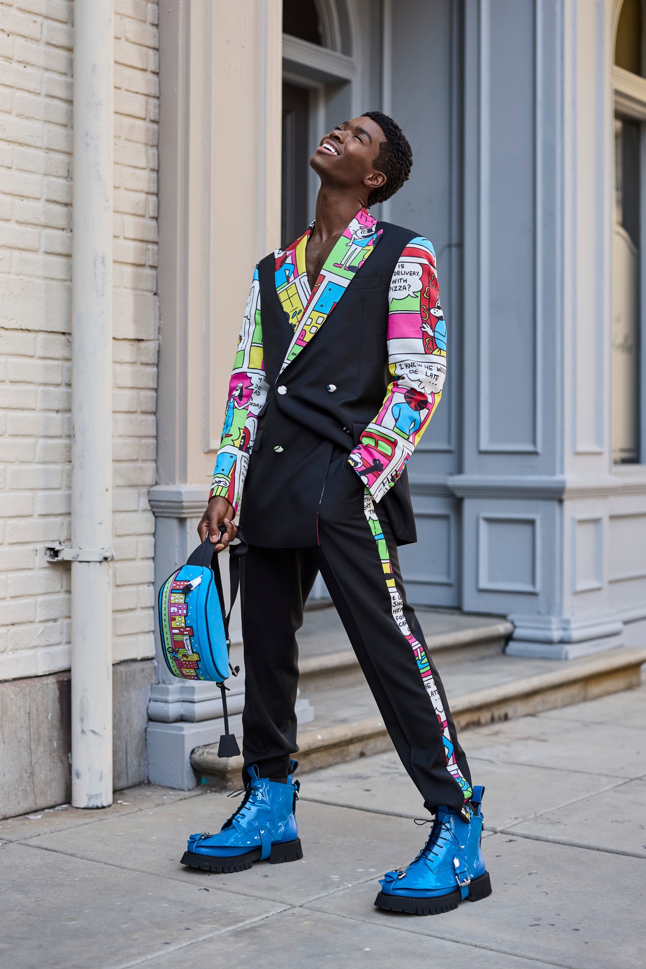 A model wearing a full look from Moschino's SS22 collection