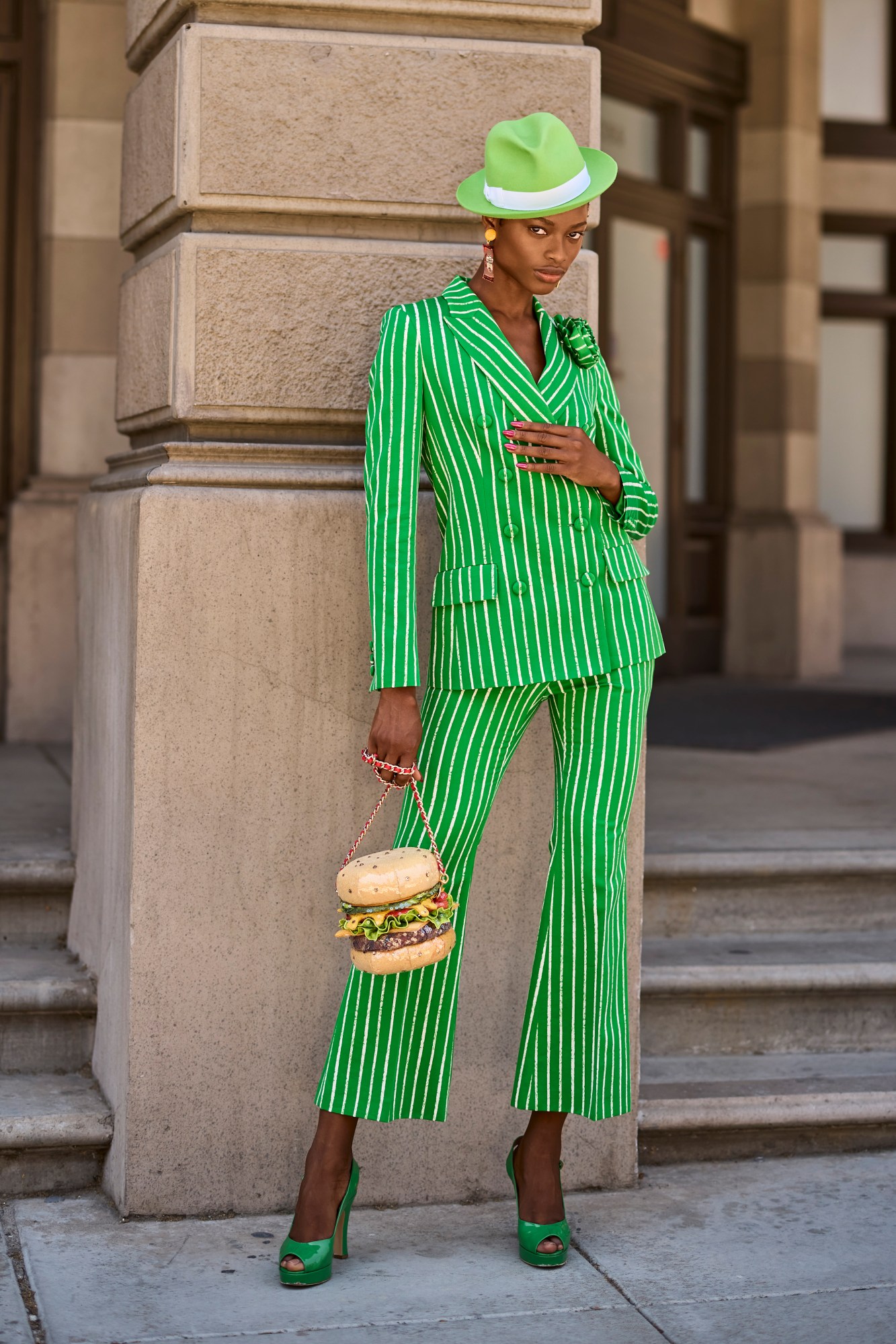 A model wearing a full look from Moschino's SS22 collection