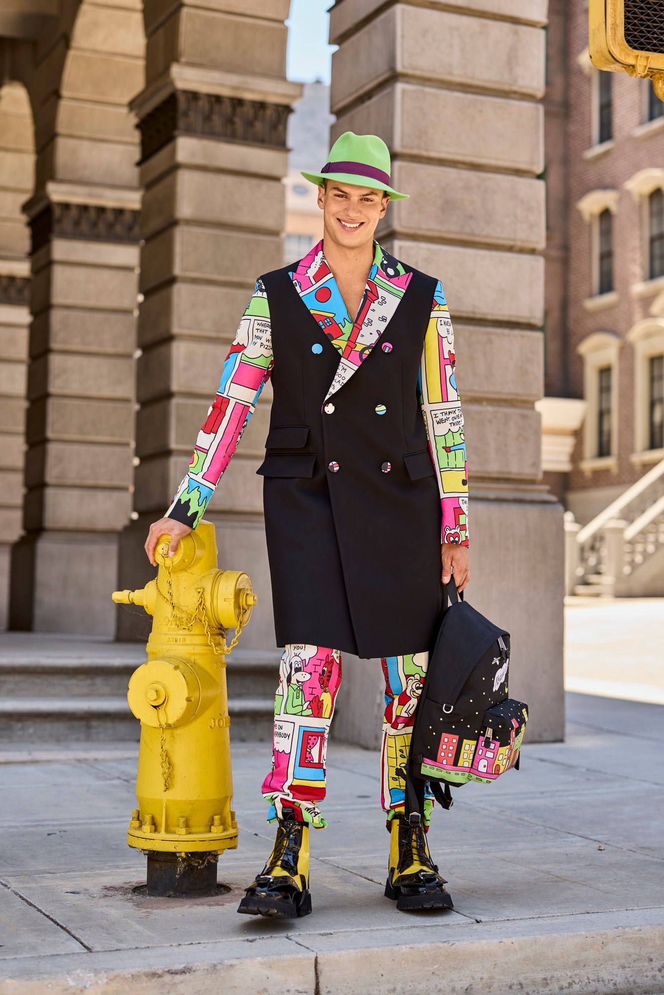 A model wearing a full look from Moschino's SS22 collection