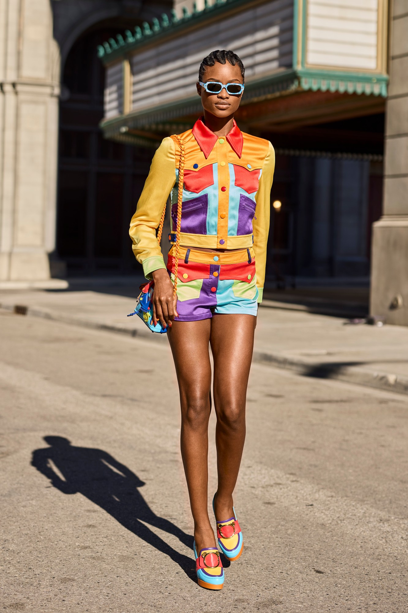 A model wearing a full look from Moschino's SS22 collection