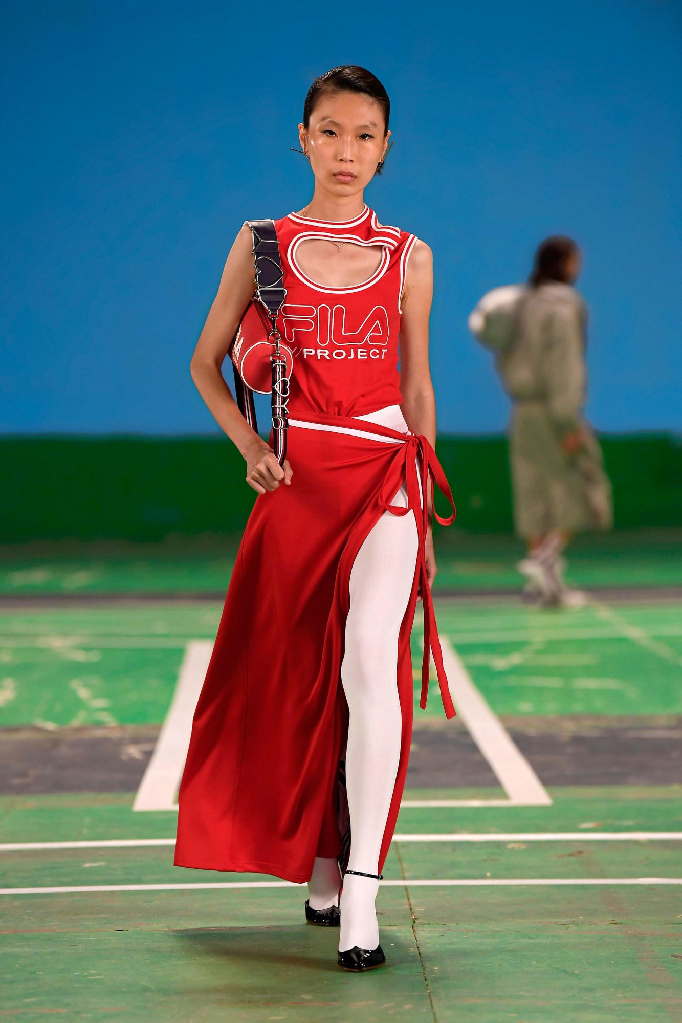 A model wearing a full look from Y/Project's SS22 collection