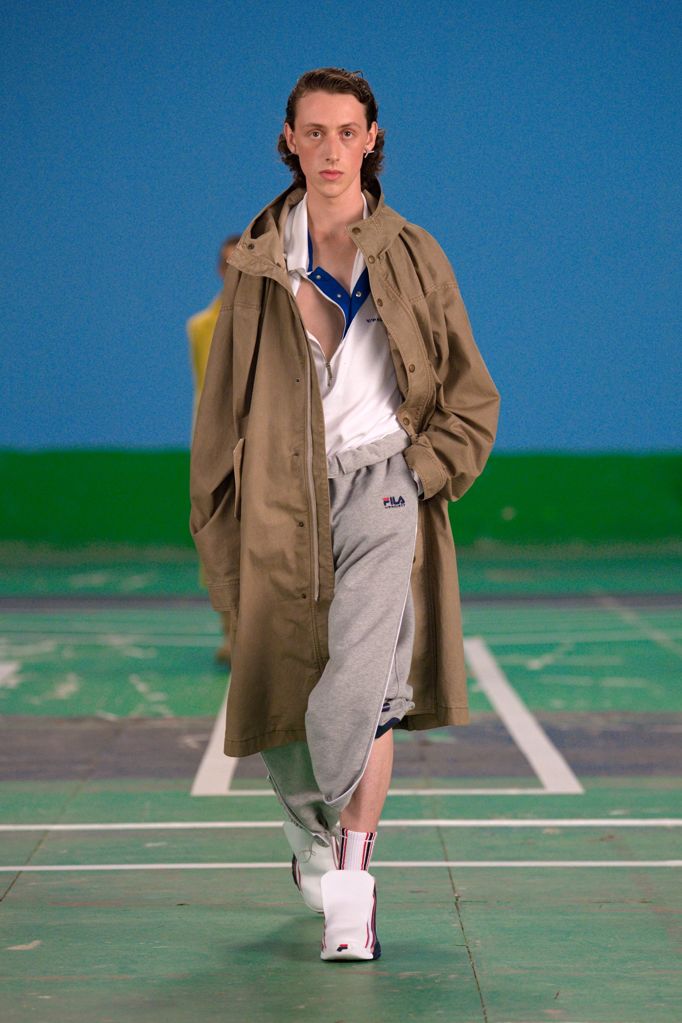 A model wearing a full look from Y/Project's SS22 collection