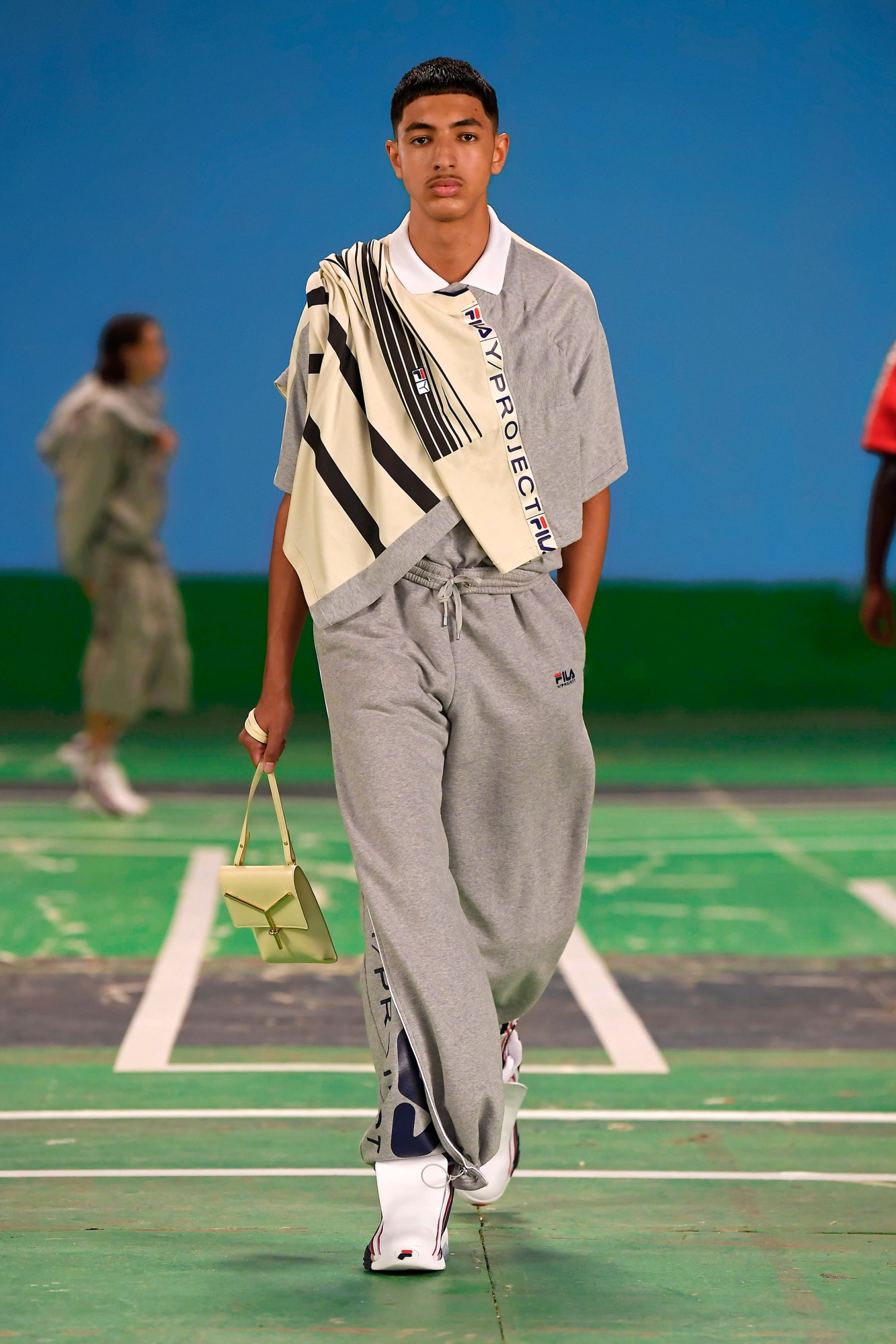 A model wearing a full look from Y/Project's SS22 collection